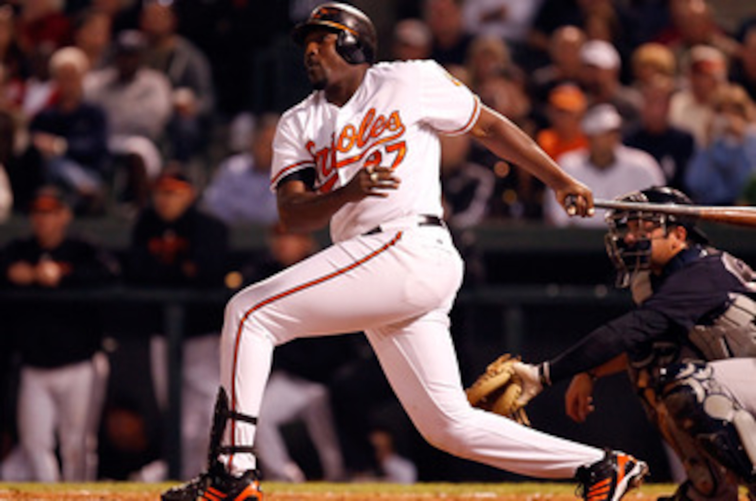 SARASOTA, FL - MARCH 07:  Designated hitter Vladimir Guerrero #27 of the Baltimore Orioles fouls off a pitch against the New York Yankees during a Grapefruit League Spring Training Game at Ed Smith Stadium on March 7, 2011 in Sarasota, Florida.  (Photo by