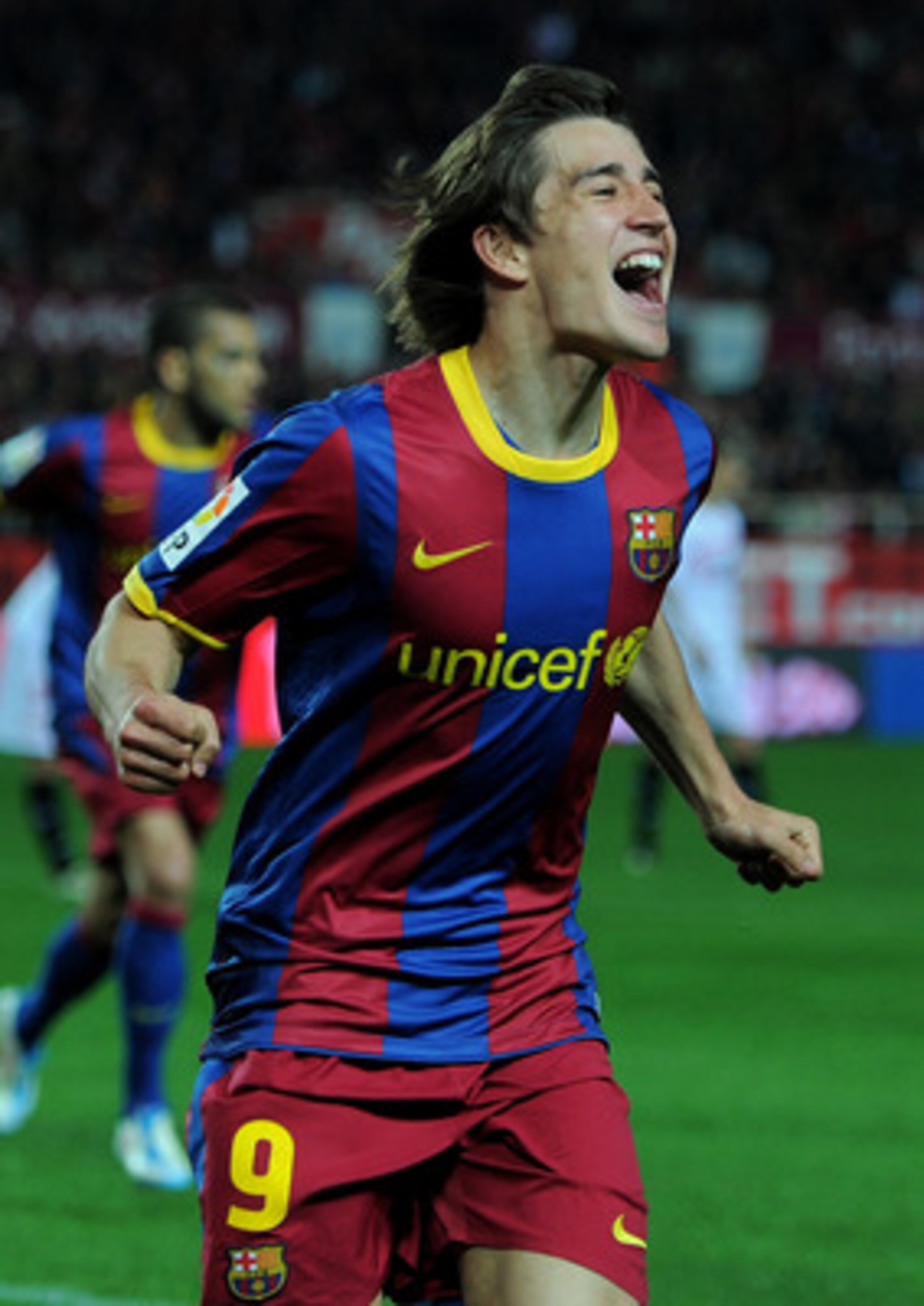 SEVILLE, SPAIN - MARCH 13:  Bojan Krkic of Barcelona celebrates scoring his sides opening goal during the la Liga match between Sevilla and Barcelona at Estadio Ramon Sanchez Pizjuan on March 13, 2011 in Seville, Spain.  (Photo by Jasper Juinen/Getty Imag