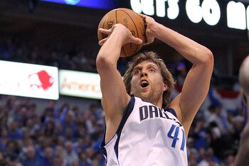 DALLAS, TX - MAY 08:  Forward Dirk Nowitzki #41 of the Dallas Mavericks takes a shot against Andrew Bynum #17 of the Los Angeles Lakers in Game Four of the Western Conference Semifinals during the 2011 NBA Playoffs on May 8, 2011 at American Airlines Cent