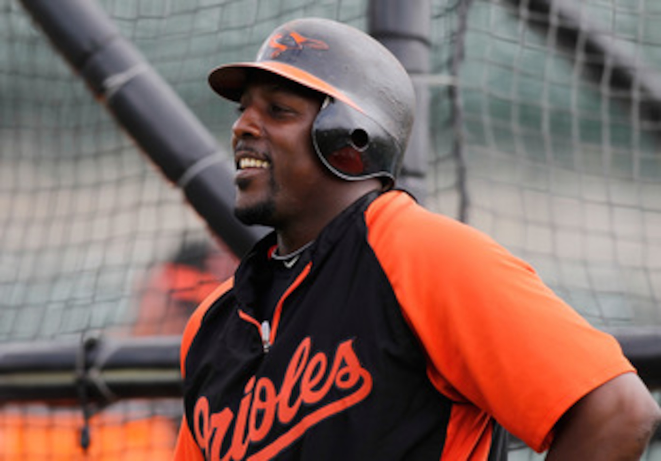 SARASOTA, FL - MARCH 05:  Designated hitter Vladimir Guerrero #27 of the Baltimore Orioles smiles during batting practice just before the start of the Grapefruit League Spring Training Game against the Boston Red Sox at Ed Smith Stadium on March 5, 2011 i