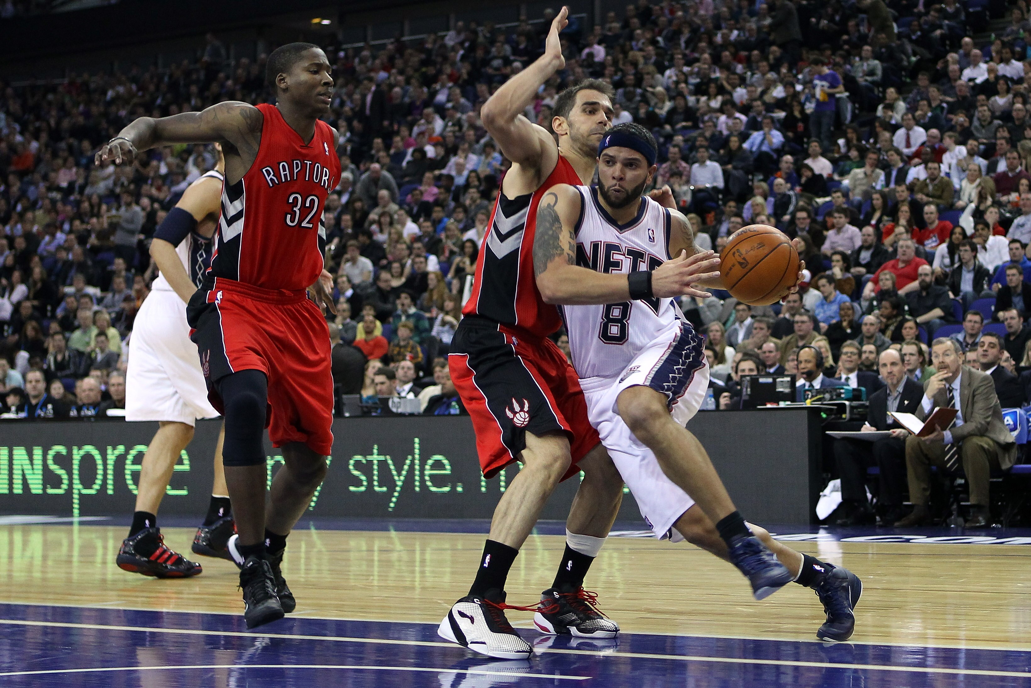 LONDON, ENGLAND - MARCH 04:  Deron Williams of the Nets runs past the Raptors defence during the NBA match between New Jersey Nets and the Toronto Raptors at the O2 Arena on March 4, 2011 in London, England. NOTE TO USER: User expressly acknowledges and a