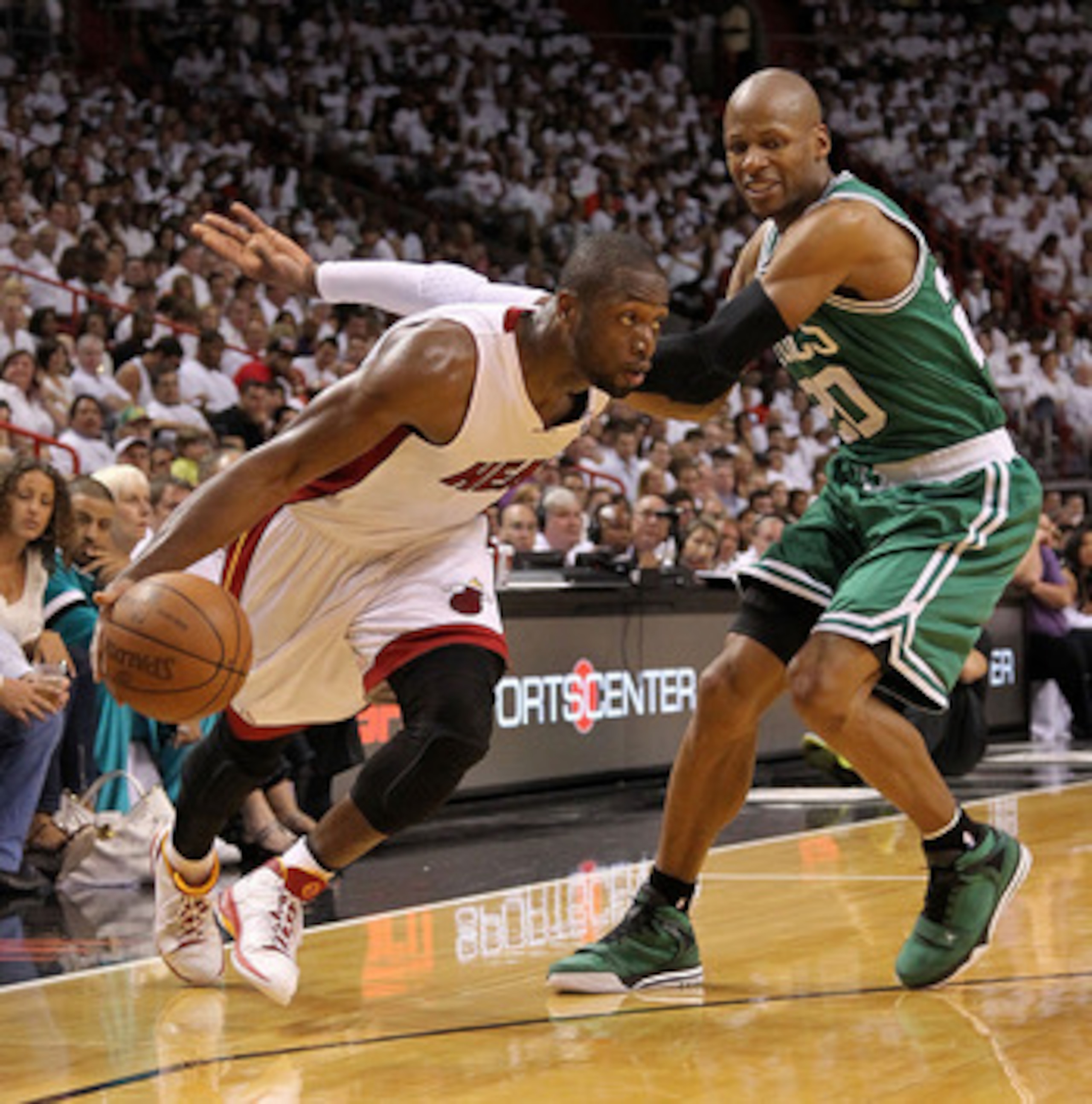 MIAMI, FL - MAY 01:  Dwyane Wade #3 of the Miami Heat drives around Ray Allen #20 of the Boston Celtics during Game One of the Eastern Conference Semifinals of the 2011 NBA Playoffs at American Airlines Arena on May 1, 2011 in Miami, Florida. NOTE TO USER