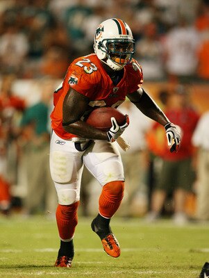 MIAMI - OCTOBER 12:  Running back Ronnie Brown #23 of the Miami Dolphins scores the game-winning touchdown against the New York Jets at Land Shark Stadium on October 12, 2009 in Miami, Florida. The Dolphins defeated the Jets 31-27.  (Photo by Doug Benc/Ge