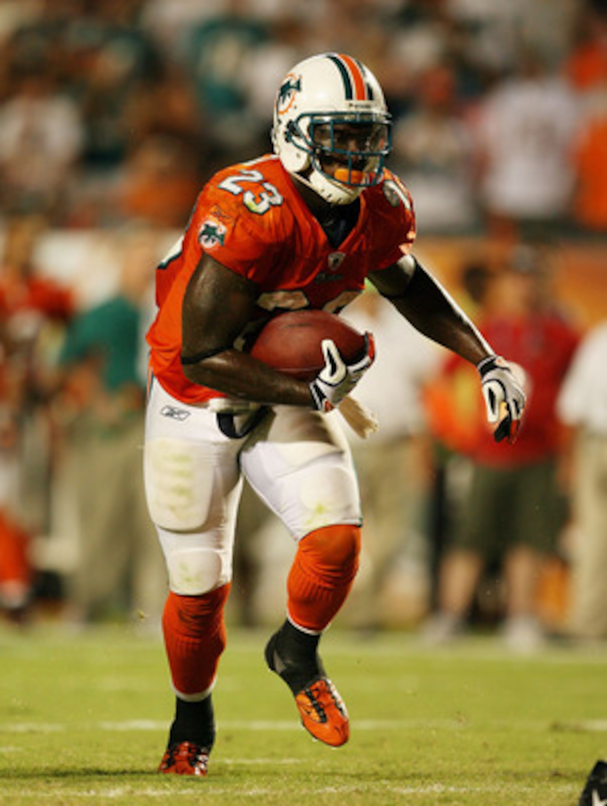 MIAMI - OCTOBER 12:  Running back Ronnie Brown #23 of the Miami Dolphins scores the game-winning touchdown against the New York Jets at Land Shark Stadium on October 12, 2009 in Miami, Florida. The Dolphins defeated the Jets 31-27.  (Photo by Doug Benc/Ge