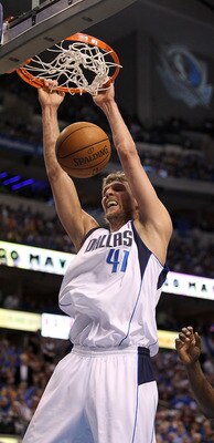 DALLAS, TX - MAY 08:  Forward Dirk Nowitzki #41 of the Dallas Mavericks gets the slam dunk against Ron Artest #15 of the Los Angeles Lakers in Game Four of the Western Conference Semifinals during the 2011 NBA Playoffs on May 8, 2011 at American Airlines 