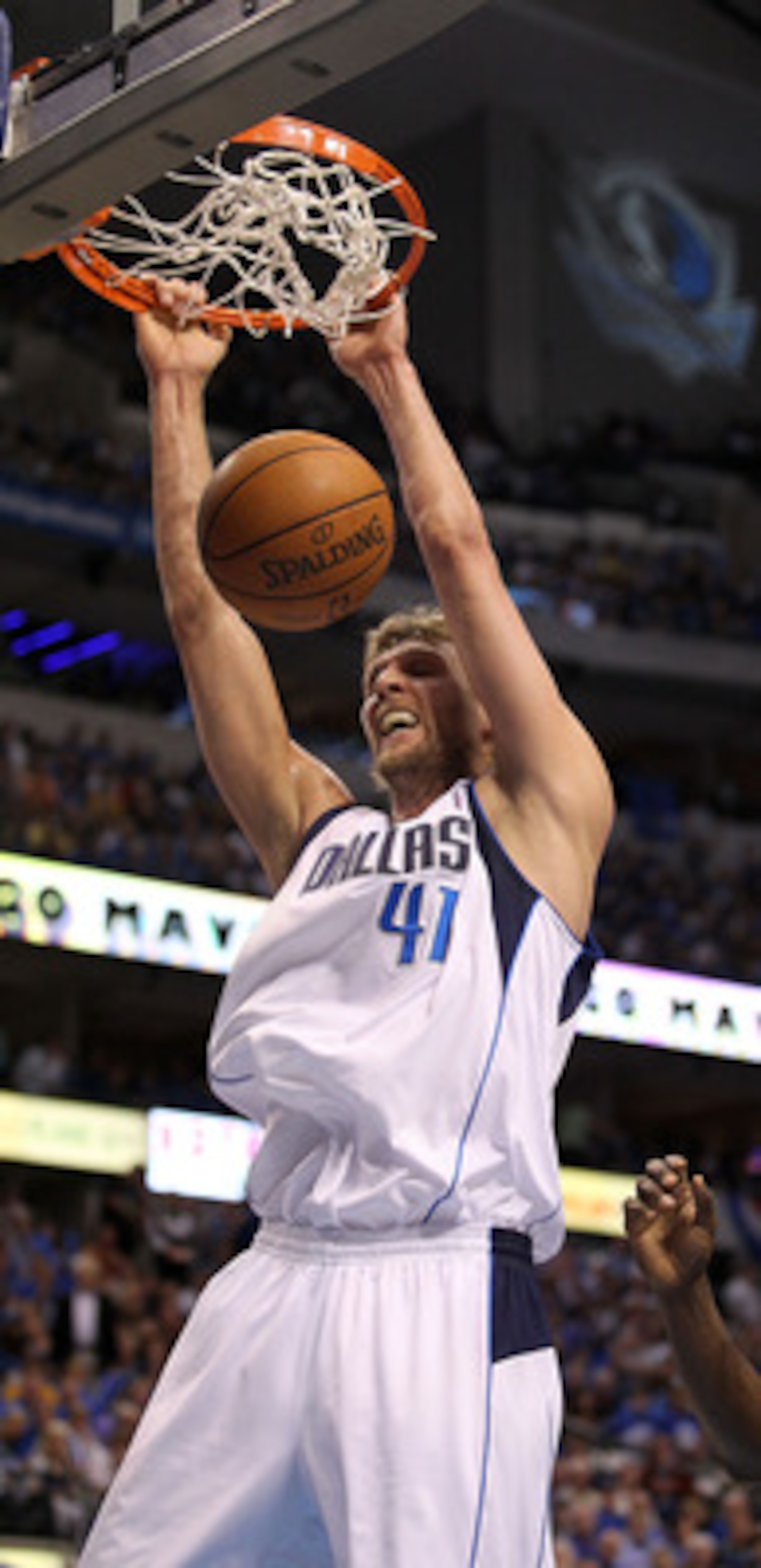 DALLAS, TX - MAY 08:  Forward Dirk Nowitzki #41 of the Dallas Mavericks gets the slam dunk against Ron Artest #15 of the Los Angeles Lakers in Game Four of the Western Conference Semifinals during the 2011 NBA Playoffs on May 8, 2011 at American Airlines 