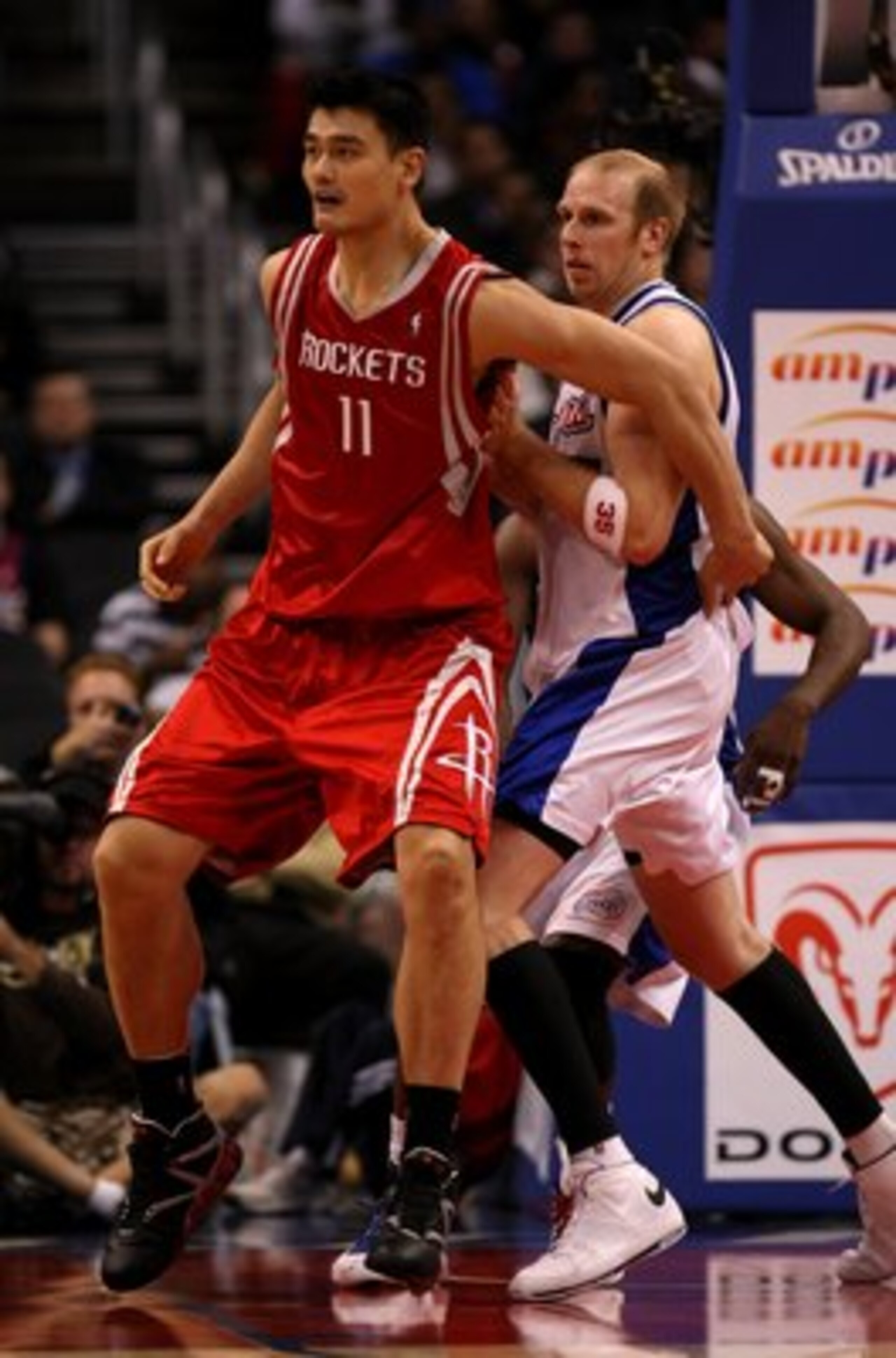 LOS ANGELES, CA - NOVEMBER 07:  Yao Ming #11 of the Houston Rockets battles for position with Chris Kaman #35 of the Los Angeles Clippers on November 7, 2008 at Staples Center in Los Angeles, California.  The Rockets won 92-83.  NOTE TO USER: User express