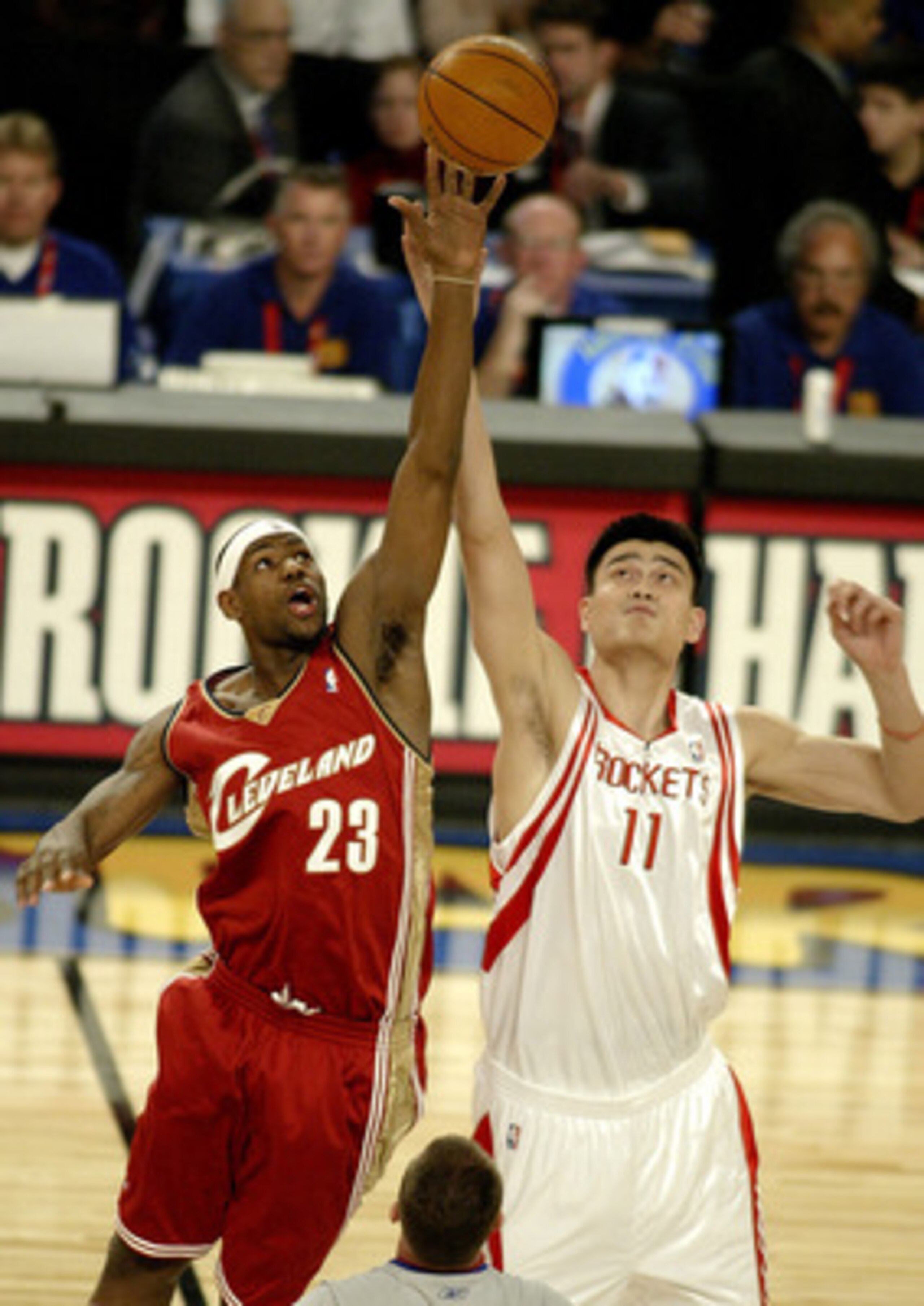 LOS ANGELES - FEBRUARY 13:  Lebron James #23 from the Cleveland Cavaliers of the Rookie Team tips off against Yao Ming #11 from the Houston Rockets of the Sophomore Team during the Got Milk? Rookie Challenge, part of the 53rd NBA All-Star weekend at the S