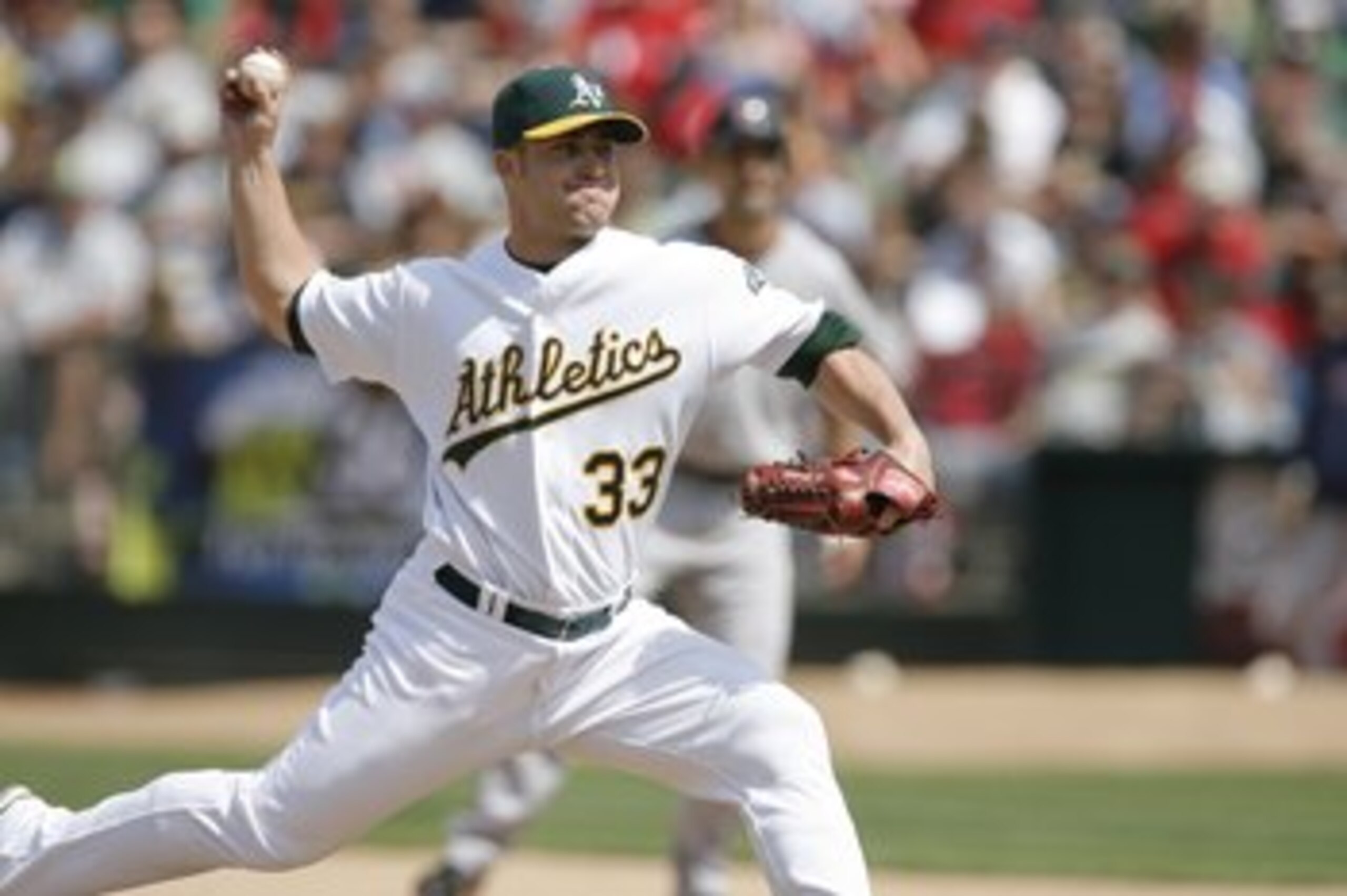 OAKLAND, CA - MAY 25: Pitcher Joey Devine #33 of the Oakland A's delivers a pitch against the Boston Red Sox on May 25, 2008 at McAfee Coliseum in Oakland, California. Oakland won 6-3. (Photo by Greg Trott/Getty Images) OAKLAND, CA - MAY 25: Pitcher Joey Devine #33 of the Oakland A's delivers a pitch against the Boston Red Sox on May 25, 2008 at McAfee Coliseum in Oakland, California. Oakland won 6-3. (Photo by Greg Trott/Getty Images)