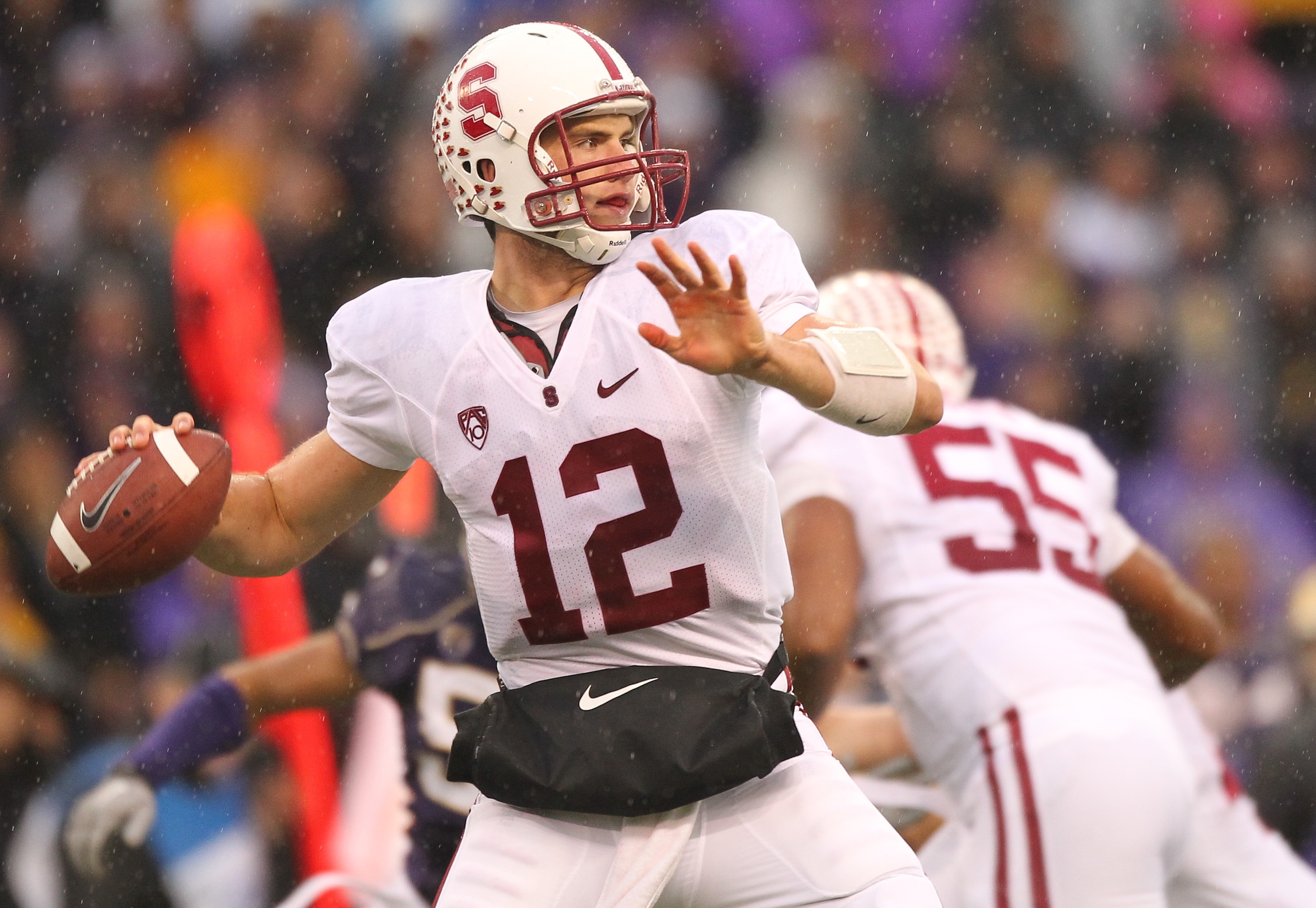 SEATTLE - OCTOBER 30:  Quarterback Andrew Luck #12 of the Stanford Cardinal passes against the Washington Huskies on October 30, 2010 at Husky Stadium in Seattle, Washington. Stanford won 41-0. (Photo by Otto Greule Jr/Getty Images)
