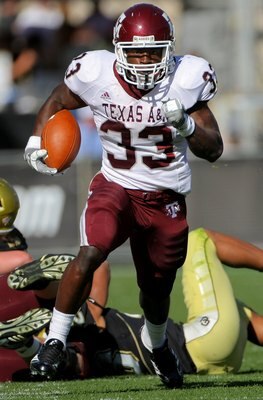 BOULDER, CO - NOVEMBER 07:  Running back Christine Michael #33 of the Texas A&M Aggies rushes against the Colorado Buffaloes during NCAA college football action at Folsom Field on November 7, 2009 in Boulder, Colorado. Colorado defeated Texas A&M 35-34.  