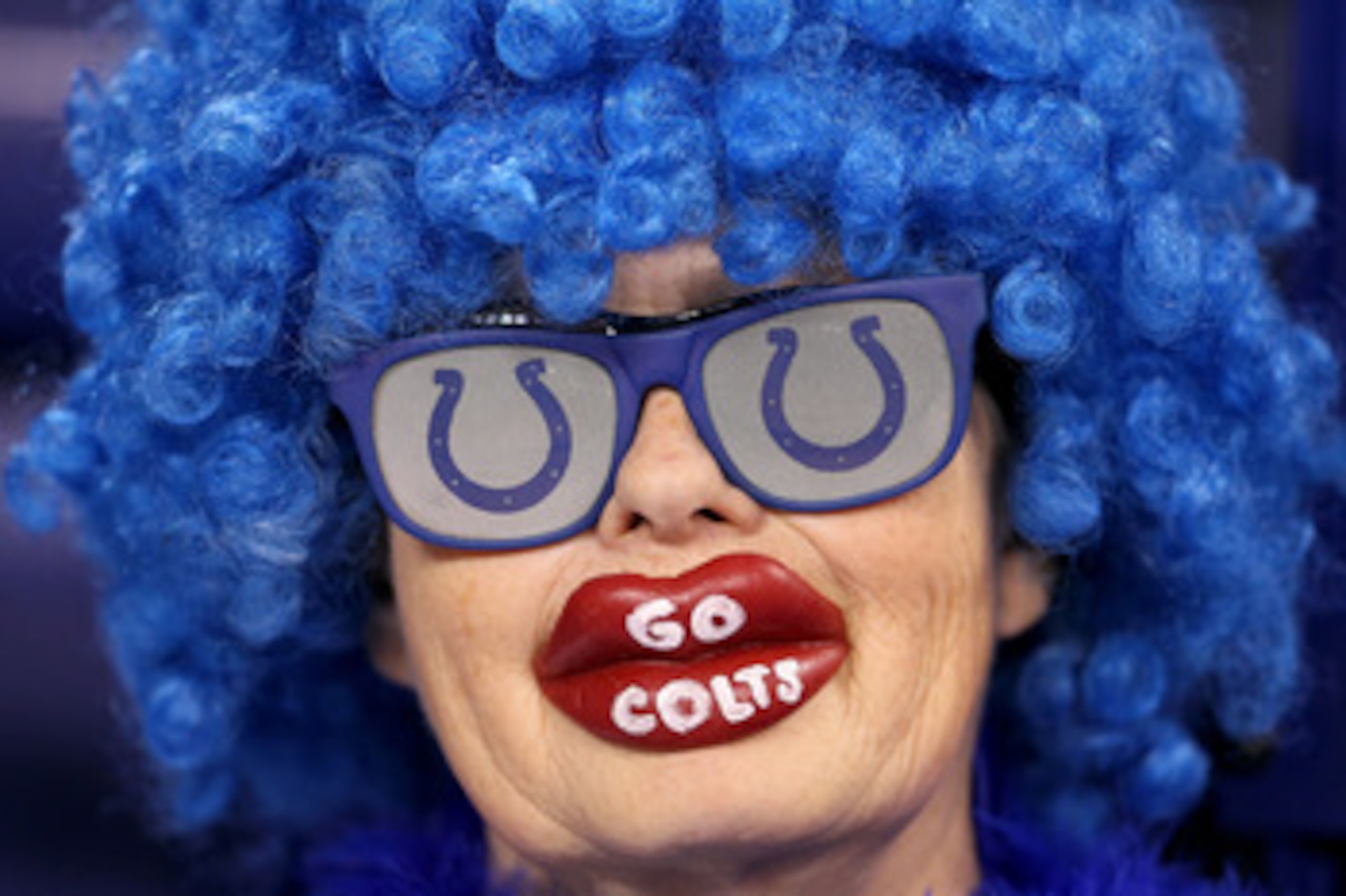 INDIANAPOLIS, IN - JANUARY 08:  A fan of the Indianapolis Colts shows support for her team against the New York Jets during their 2011 AFC wild card playoff game at Lucas Oil Stadium on January 8, 2011 in Indianapolis, Indiana.  (Photo by Andy Lyons/Getty