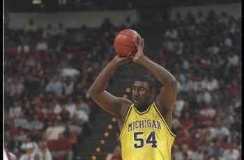 28 Dec 1995: Center Robert Traylor of the Michigan Wolverines looks to pass the ball during a game against the UNLV Rebels in Las Vegas, Nevada. UNLV won the game, 66-64.