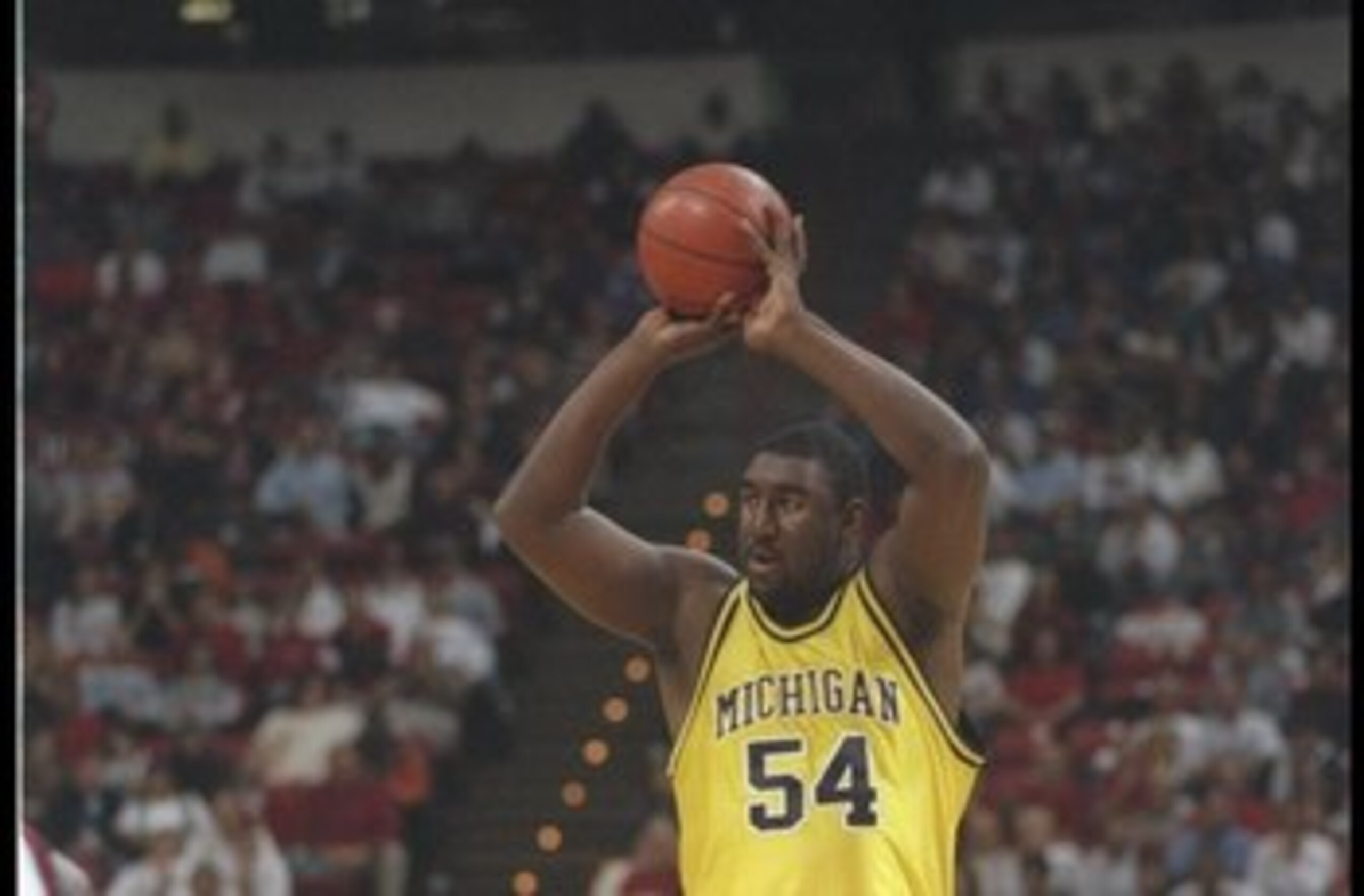 28 Dec 1995: Center Robert Traylor of the Michigan Wolverines looks to pass the ball during a game against the UNLV Rebels in Las Vegas, Nevada. UNLV won the game, 66-64.