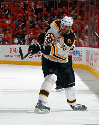PHILADELPHIA, PA - MAY 02:  Zdeno Chara #33 of the Boston Bruins shoots the puck during Game Two of the Eastern Conference Semifinals against the Philadelphia Flyers during the 2011 NHL Stanley Cup Playoffs at Wells Fargo Center on May 2, 2011 in Philadel