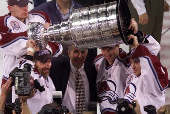 9 Jun 2001: Ray Bourque, coach Bob Hartley, Patrick Roy and Joe Sakic of the Colorado Avalanche celebrate defeating the New Jersey Devils to win the Stanley Cup finals at the Pepsi Center in Denver, Colorado. The Avalanche defeated the Devils 3-1 to win t