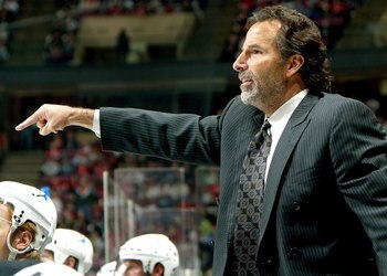 EAST RUTHERFORD, NJ - APRIL 14:  Head coach John Tortorella of the Tampa Bay Lightning yells to his team against the New Jersey Devils in Game 2 of the 2007 Eastern Conference Quarterfinals on April 14, 2007 at Continental Airlines Arena in East Rutherfor