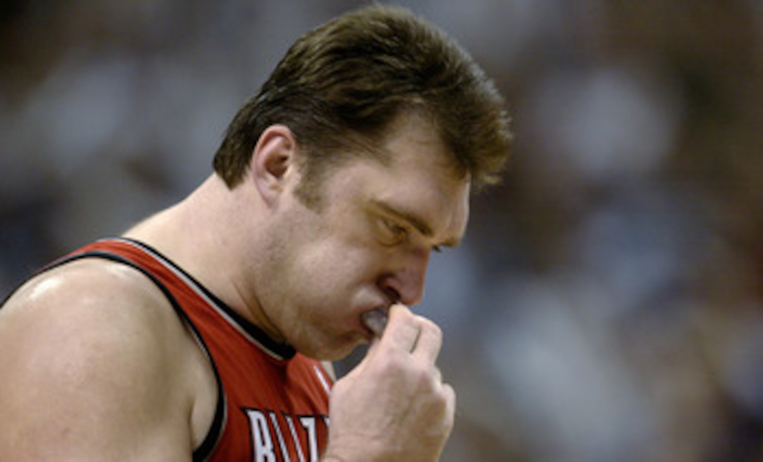 DALLAS - MAY 4:  Arvydas Sabonis #11 of the Portland Trail Blazers removes his mouth guard in Game seven of the Western Conference Quarterfinals against the Dallas Mavericks during the 2003 NBA Playoffs at American Airlines Center on May 4, 2003 in Dallas