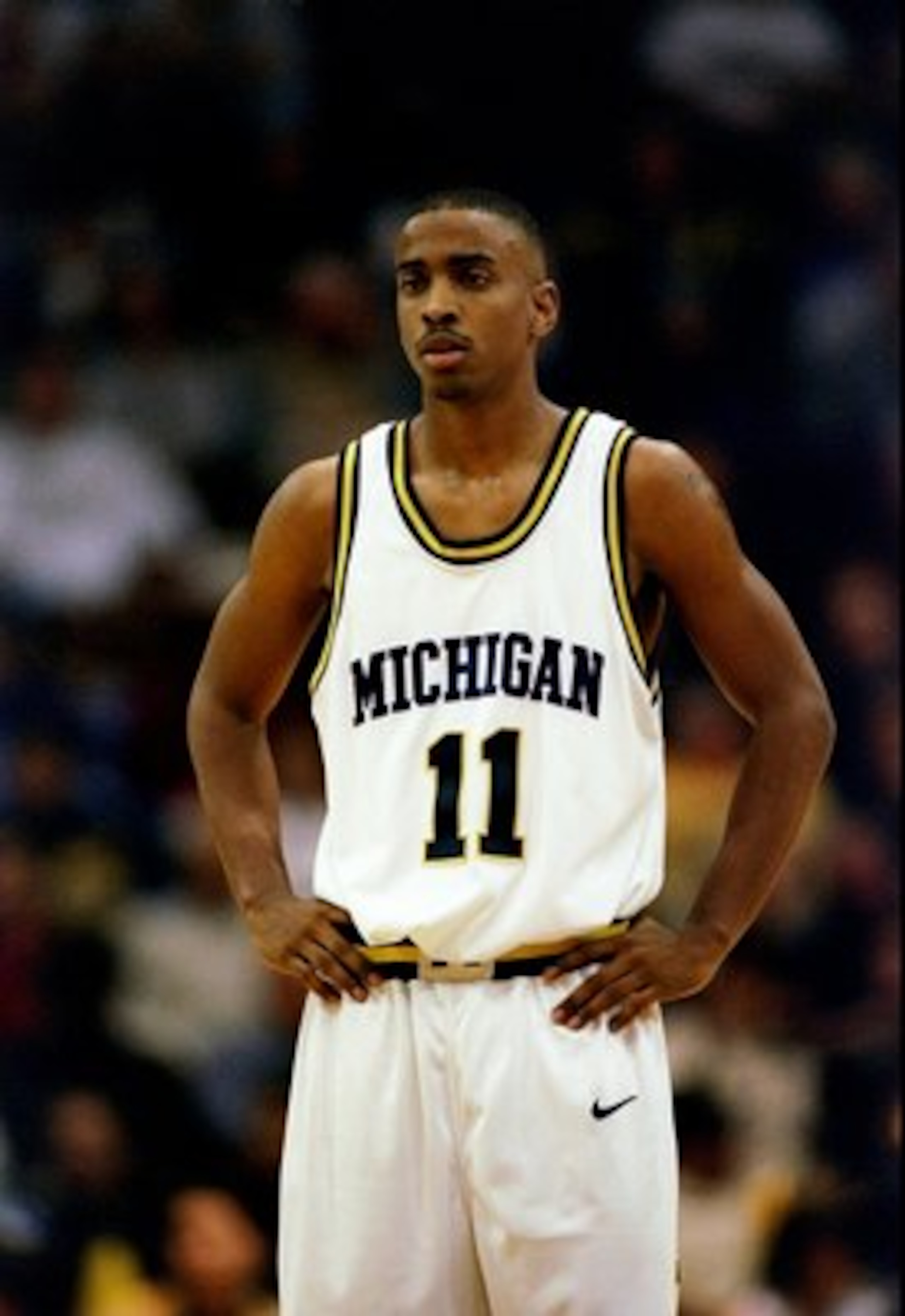 13 Dec 1997:  Guard Louis Bullock of the Michigan Wolverines looks on during a game against the Duke Blue Devils at Crisler Arena in Ann Arbor, Michigan.  Michigan won the game 81-73. Mandatory Credit: Matthew Stockman  /Allsport
