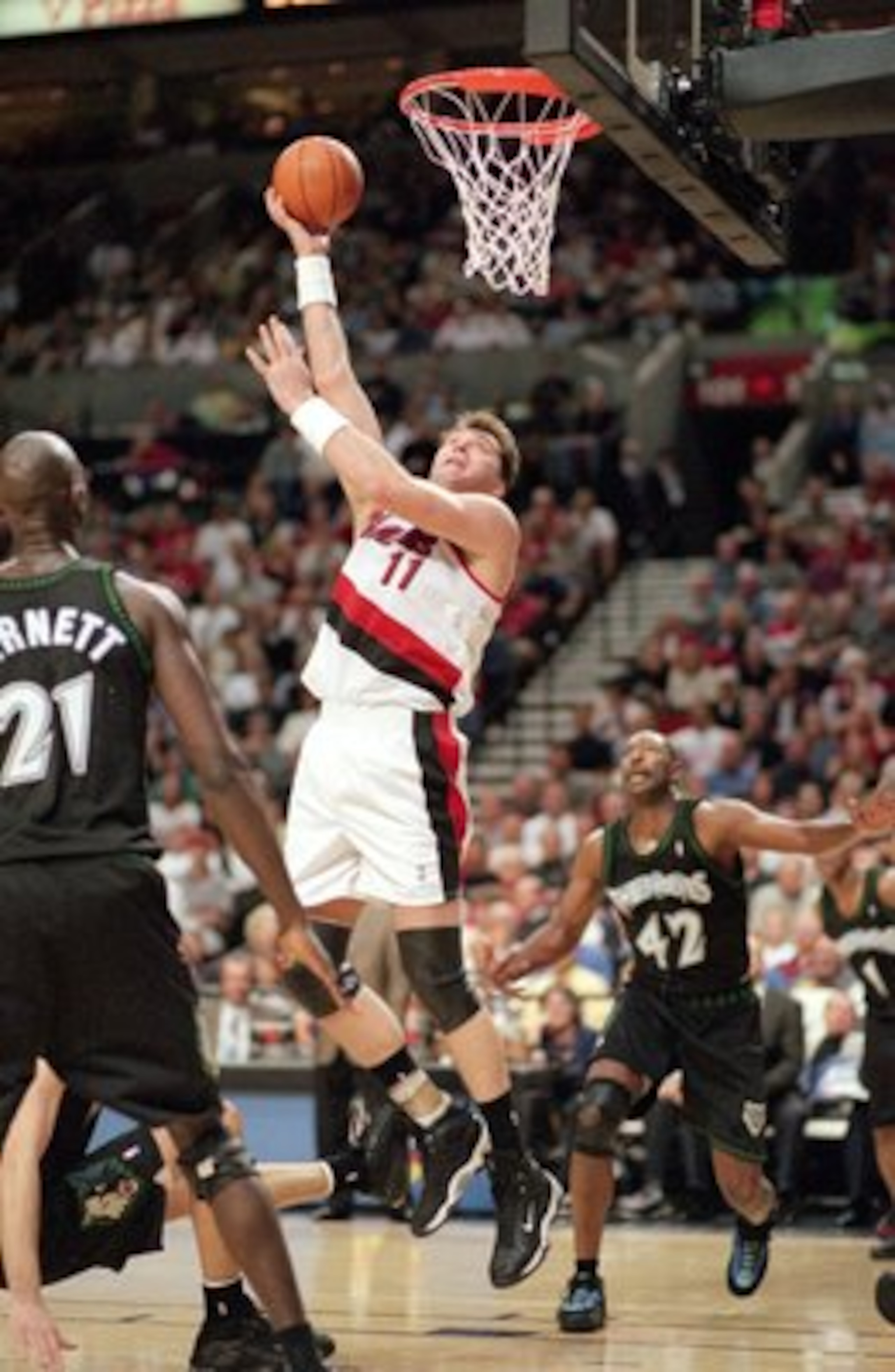 26 Apr 2000: Arvydas Sabonis #11 of the Portland Trailblazers makes a layup during the NBA Western Conference Playoffs Round One Game against the Minnesota Timberwolves at the Rose Garden in Portland, Oregon. The Trailblazers defeated the Timberwolves 86-