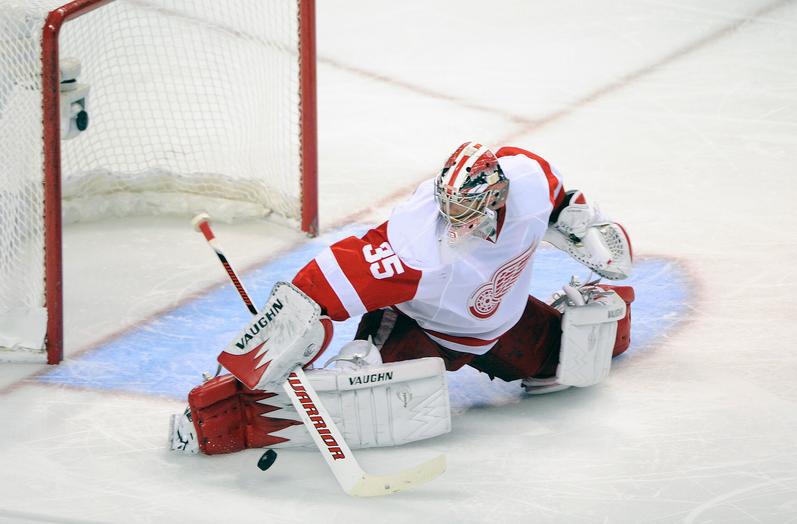 SAN JOSE, CA - MAY 12: Goalie Jimmy Howard #35 the Detroit Red Wings makes a save in the second period in Game Seven of the Western Conference Semifinals  during the 2011 NHL Stanley Cup Playoffs at the HP Pavilion on May 12, 2011 in San Jose, California.