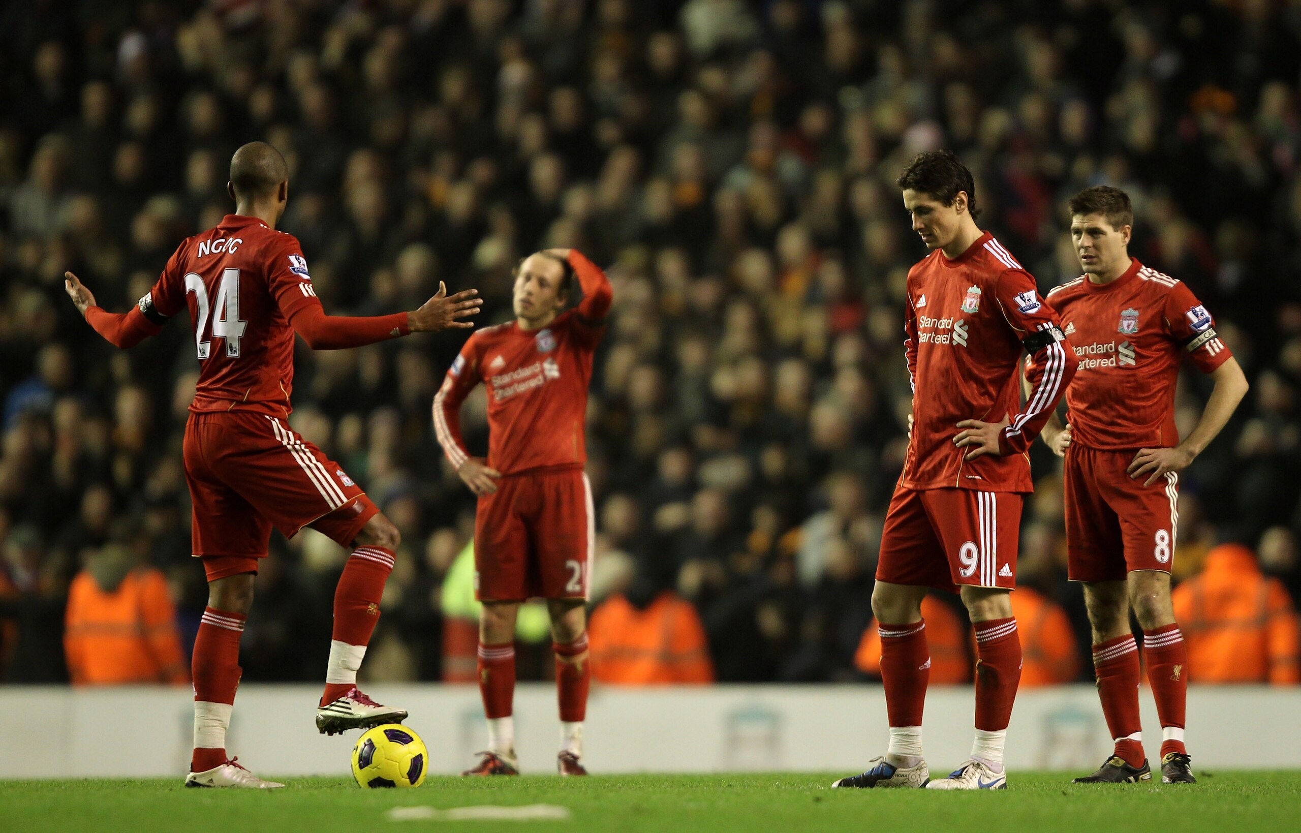LIVERPOOL, ENGLAND - DECEMBER 29:  David Ngog, Lucas, Fernando Torres and Steven Gerrard (R) of Liverpool look dejected after Wolverhampton Wanderers opened the scoring during the Barclays Premier League match between Liverpool and Wolverhampton Wanderers