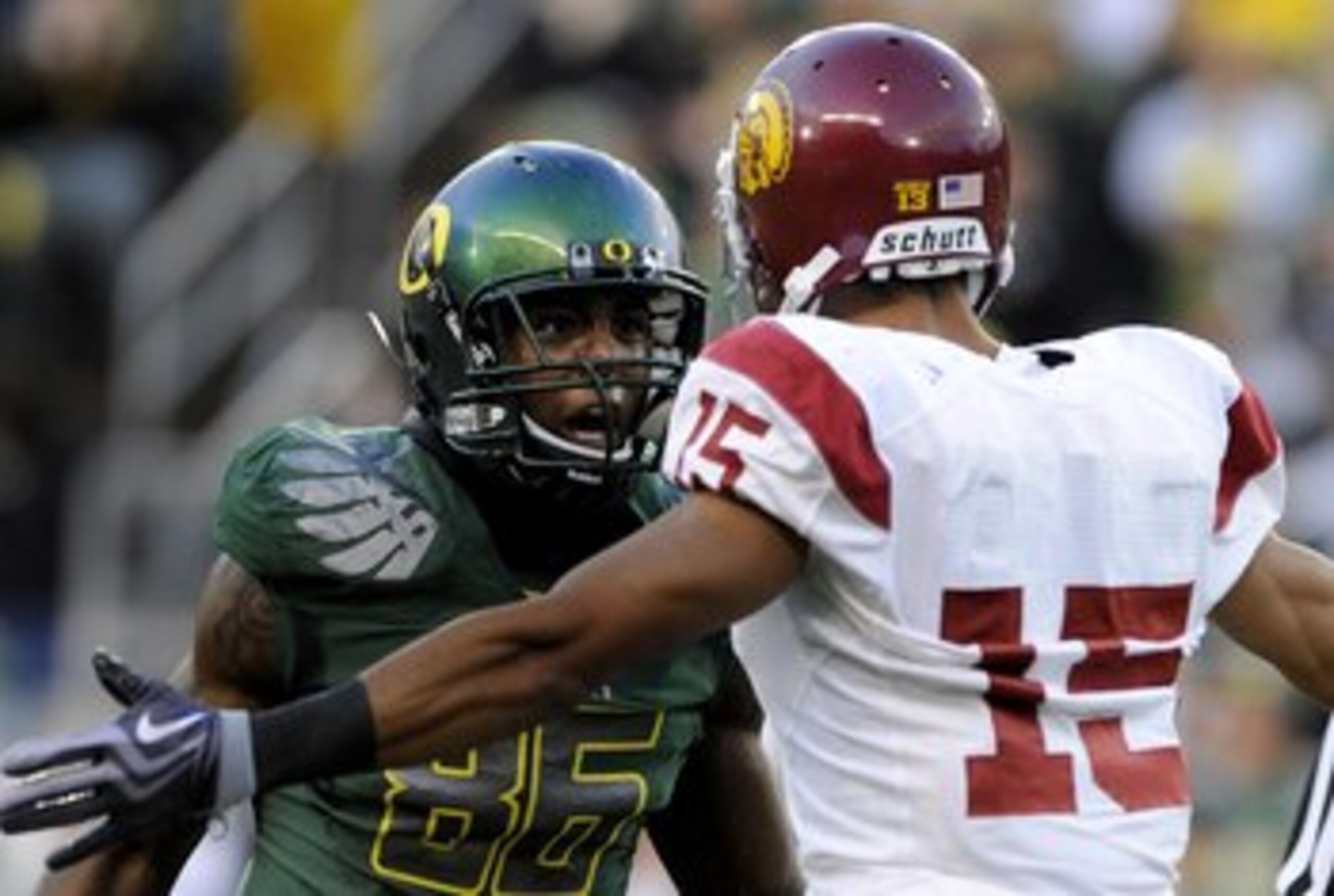 EUGENE, OR - OCTOBER 31: Wide receiver Garrett Embry #86 of the Oregon Ducks gets in the face of cornerback Kevin Thomas #15 of the  USC Trojans during action in the first quarter of the game at Autzen Stadium on October 31, 2009 in Eugene, Oregon. Oregon