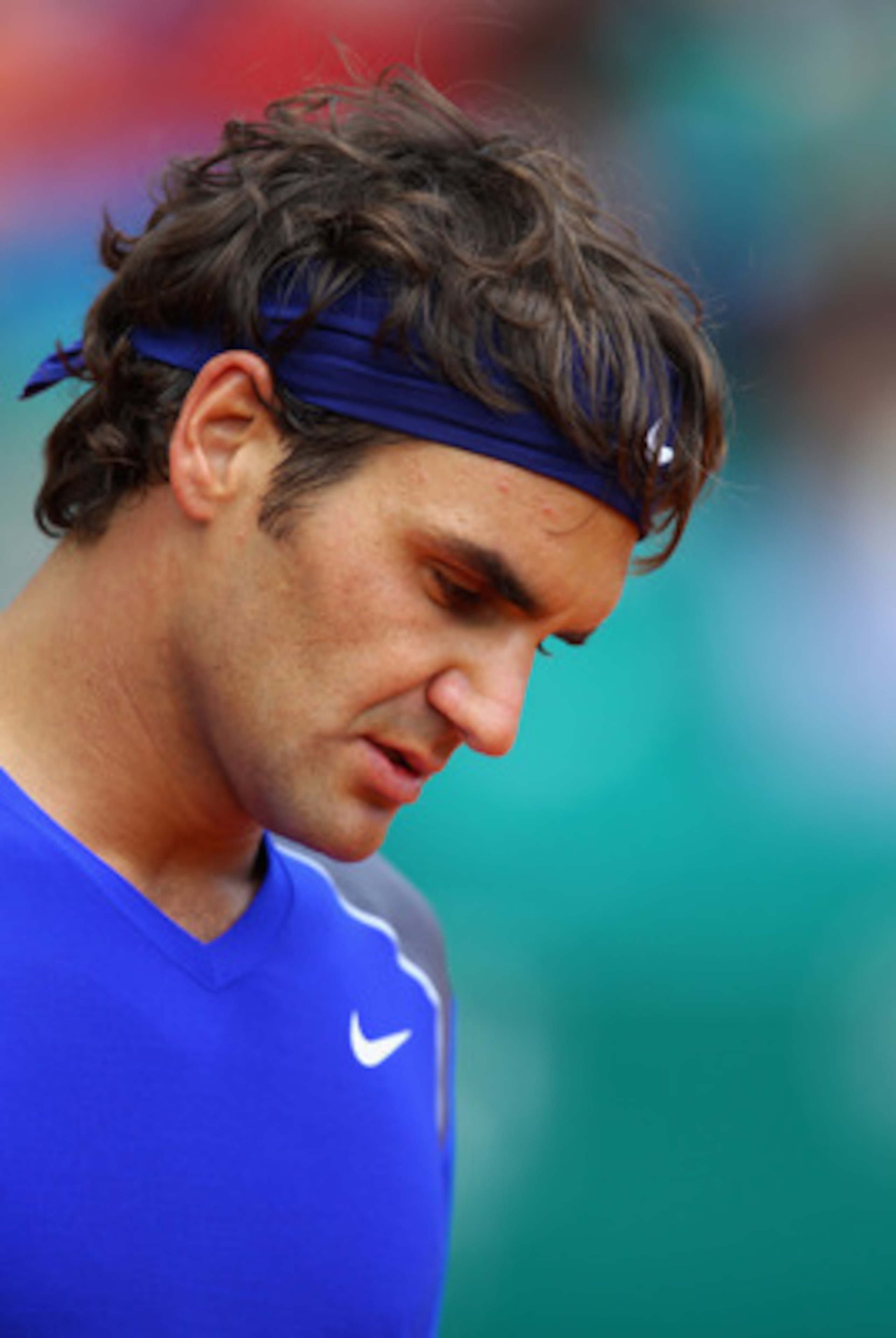 MONACO - APRIL 15:  Roger Federer of Switzerland looks down in his match against Jurgen Melzer of Austria during Day Six of the ATP Masters Series Tennis at the Monte Carlo Country Club on April 15, 2011 in Monte Carlo, Monaco.  (Photo by Julian Finney/Ge