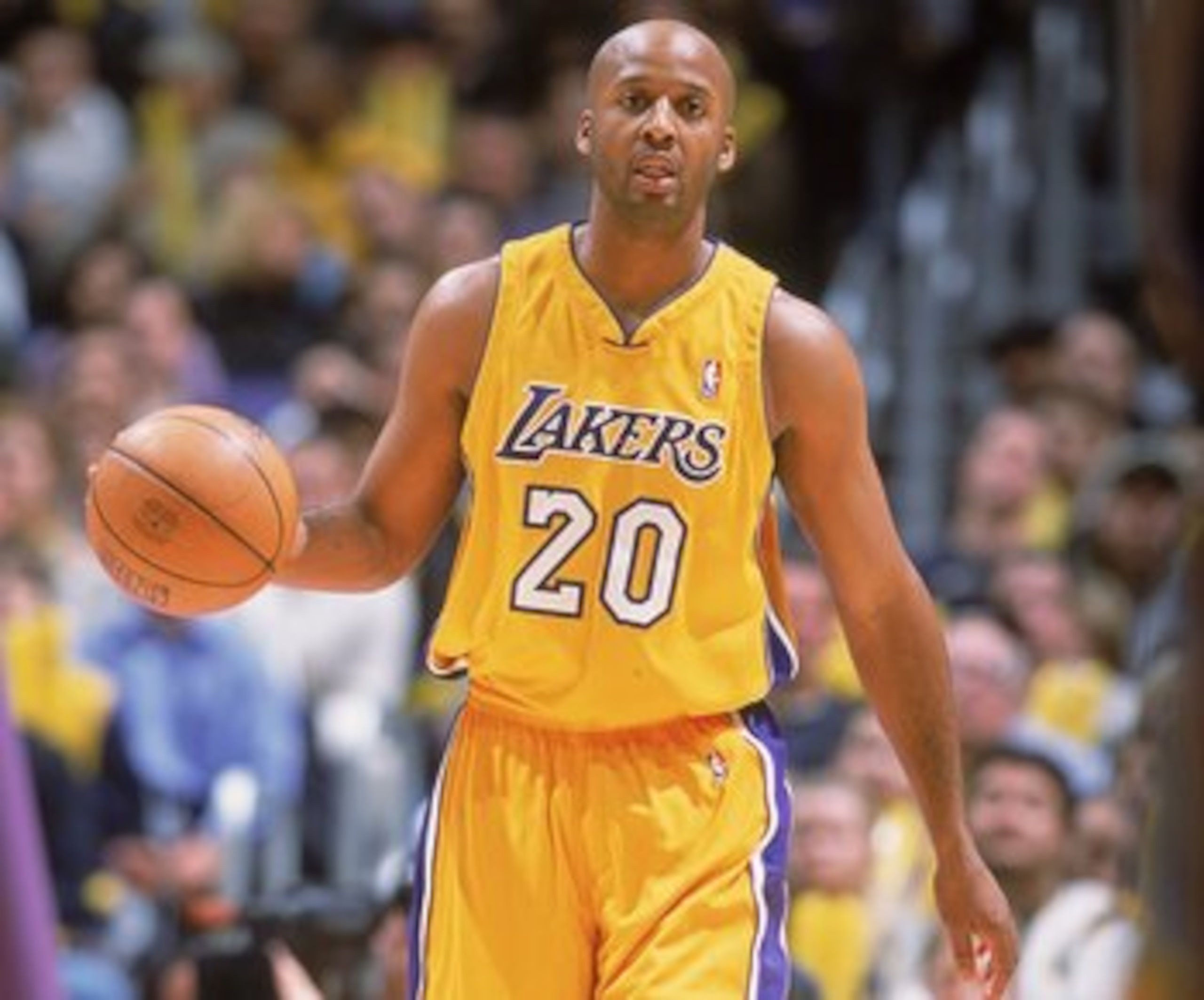 7 Feb 2001:  Brian Shaw #20 of the Los Angeles Lakers dribbles the ball on the court during the Phoenix Suns at the Staples Center in Los Angeles, California. The Lakers defeated the Suns 85-83.  NOTE TO USER: It is expressly understood that the only righ