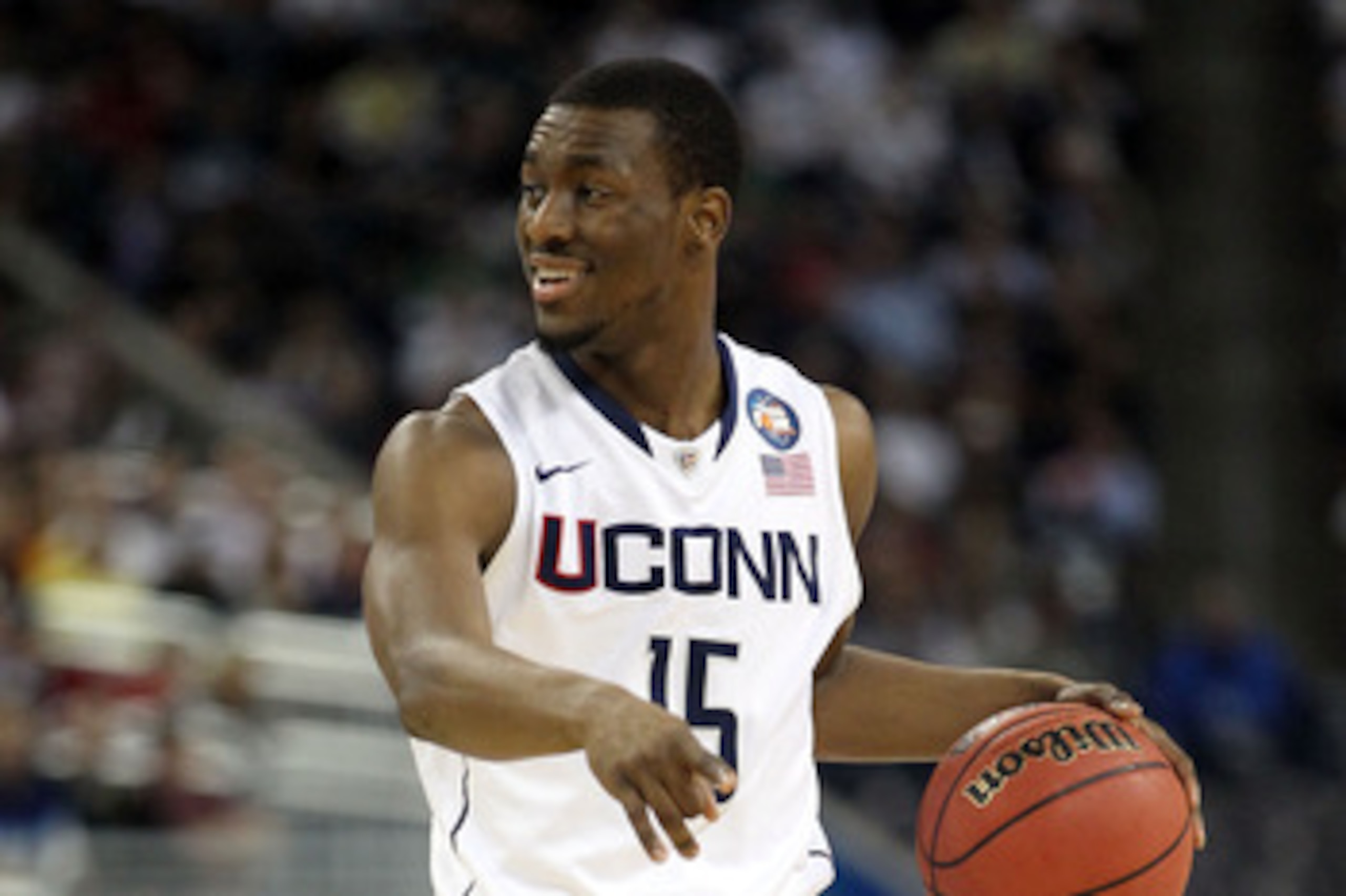 HOUSTON, TX - APRIL 04: Kemba Walker #15 of the Connecticut Huskies handles the ball against the Butler Bulldogs during the National Championship Game of the 2011 NCAA Division I Men's Basketball Tournament at Reliant Stadium on April 4, 2011 in Houston, HOUSTON, TX - APRIL 04: Kemba Walker #15 of the Connecticut Huskies handles the ball against the Butler Bulldogs during the National Championship Game of the 2011 NCAA Division I Men's Basketball Tournament at Reliant Stadium on April 4, 2011 in Houston,