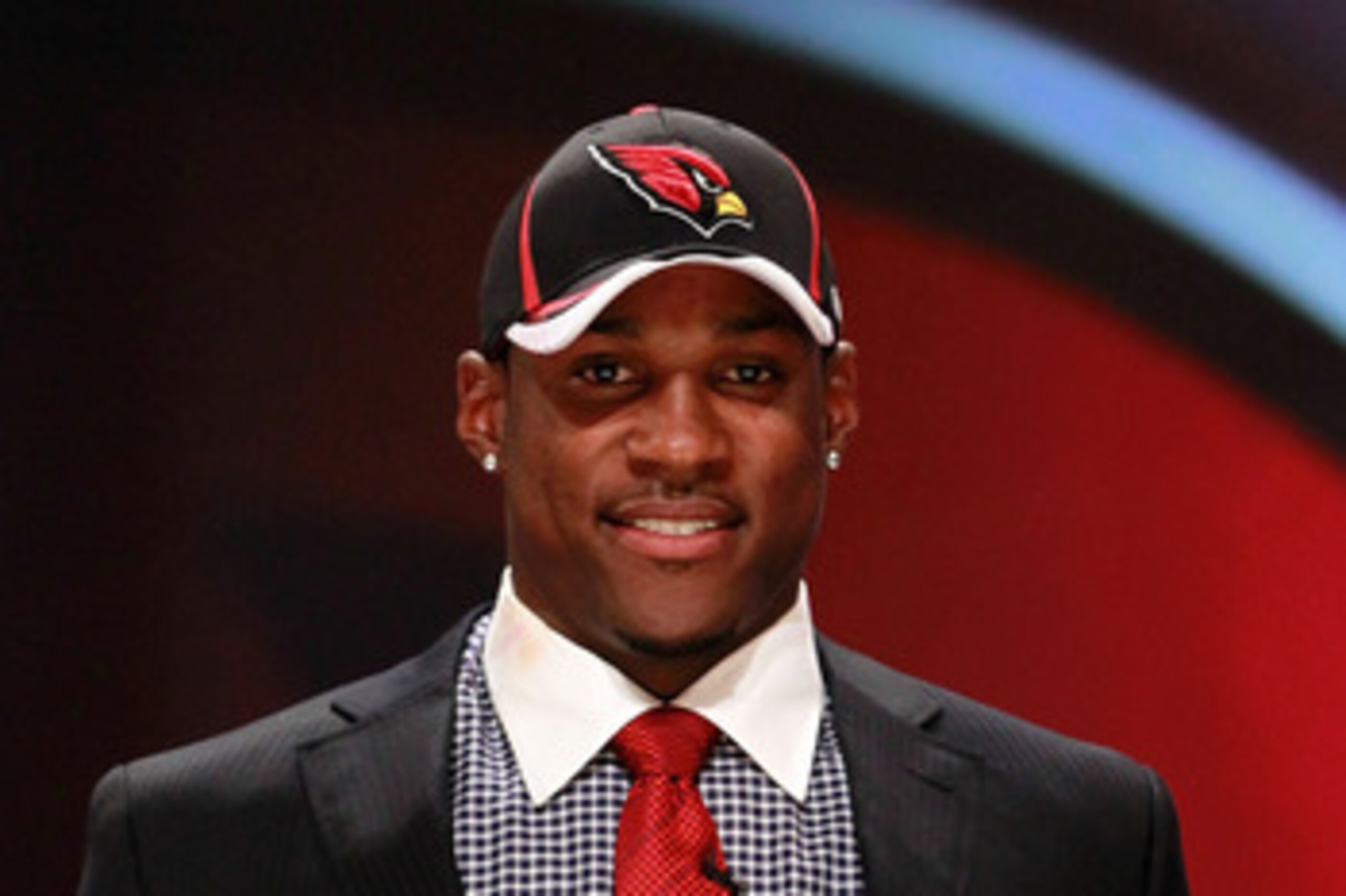 NEW YORK, NY - APRIL 28:  Patrick Peterson, #5 overall pick by the Arizona Cardinals, holds up his jersey on stage during the 2011 NFL Draft at Radio City Music Hall on April 28, 2011 in New York City.  (Photo by Chris Trotman/Getty Images)