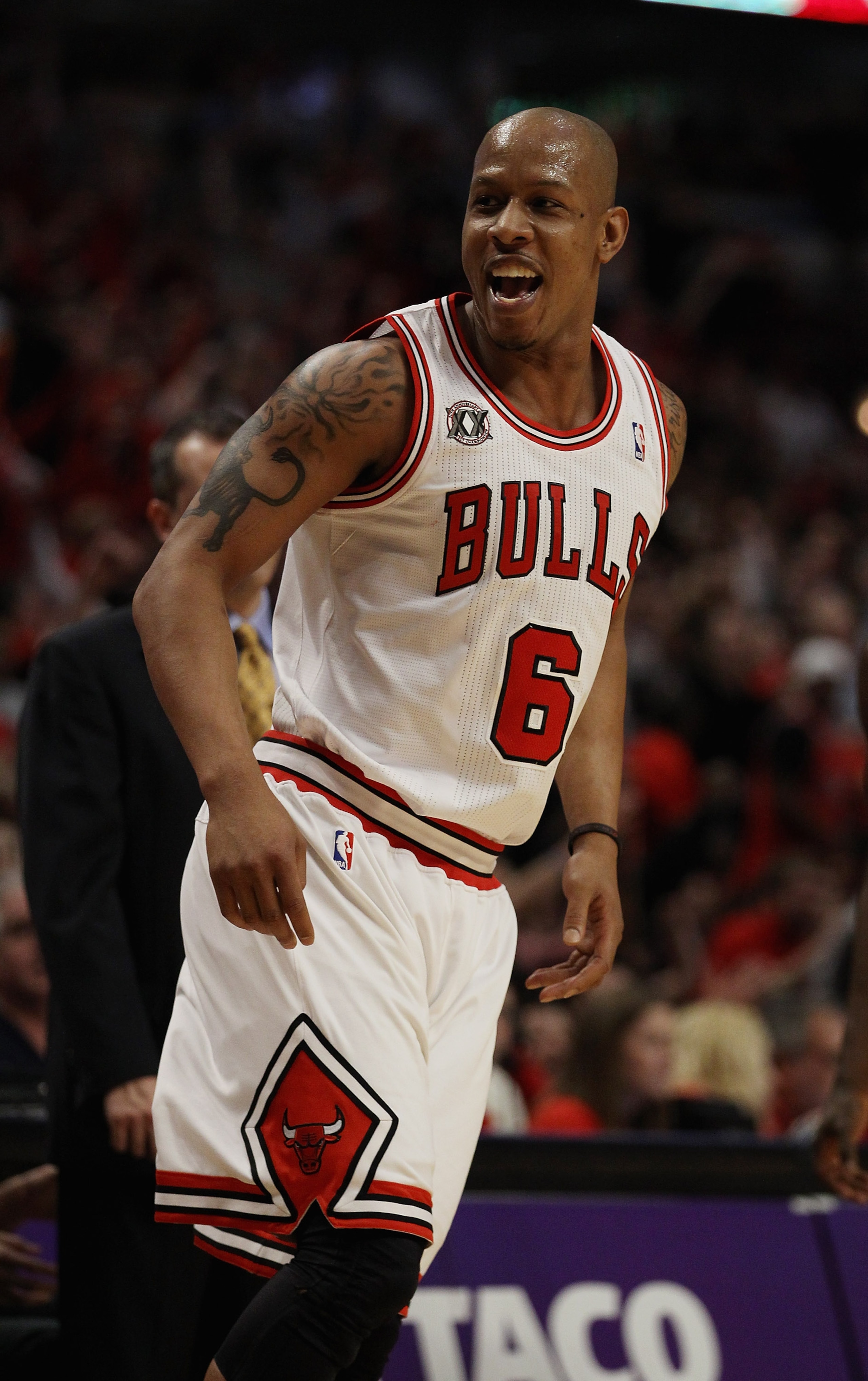 CHICAGO, IL - APRIL 26: Keith Bogans #6 of the Chicago Bulls talks to members of the Indiana Pacers sitting on the bench after hitting a three-point shot in Game Five of the Eastern Conference Quarterfinals in the 2011 NBA Playoffs at the United Center on