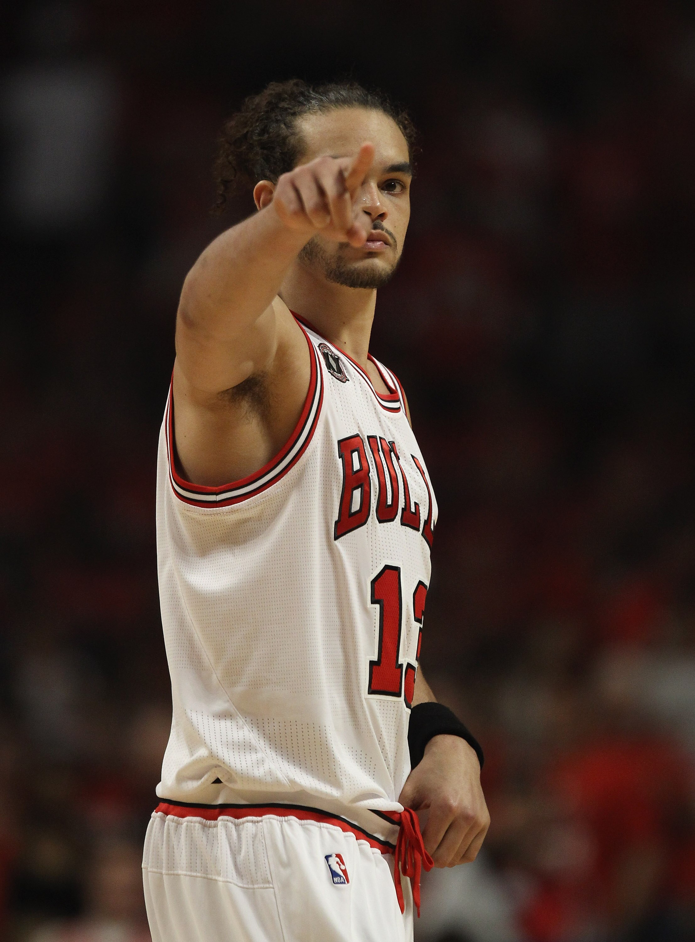 CHICAGO, IL - MAY 10: Joakim Noah #13 of the Chicago Bulls points to family in the stands before taking on Atlanta Hawks in Game Five of the Eastern Conference Semifinals in the 2011 NBA Playoffs at the United Center on May 10, 2011 in Chicago, Illinois. 