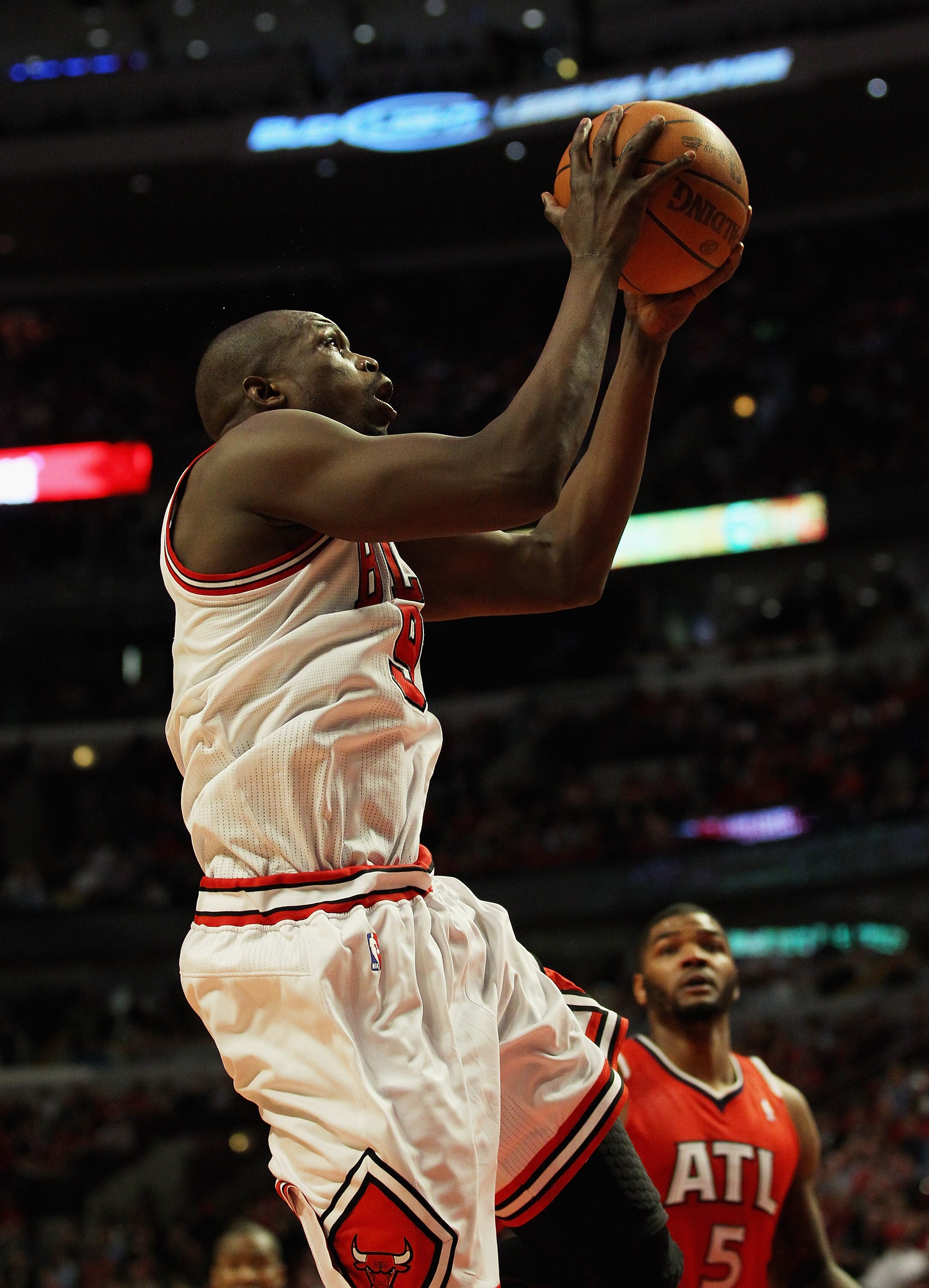 CHICAGO, IL - MAY 04: Loul Deng #9 of the Chicago Bulls goes up for a shot against the Atlanta Hawks in Game Two of the Eastern Conference Semifinals in the 2011 NBA Playoffs at the United Center on May 4, 2011 in Chicago, Illinois. The Bulls defeated the