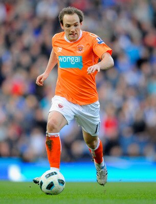 BLACKBURN, ENGLAND - MARCH 19: David Vaughan of Blackpool on the ball during the Barclays Premier League match between Blackburn Rovers and Blackpool at Ewood Park on March 19, 2011 in Blackburn, England.  (Photo by Michael Regan/Getty Images)