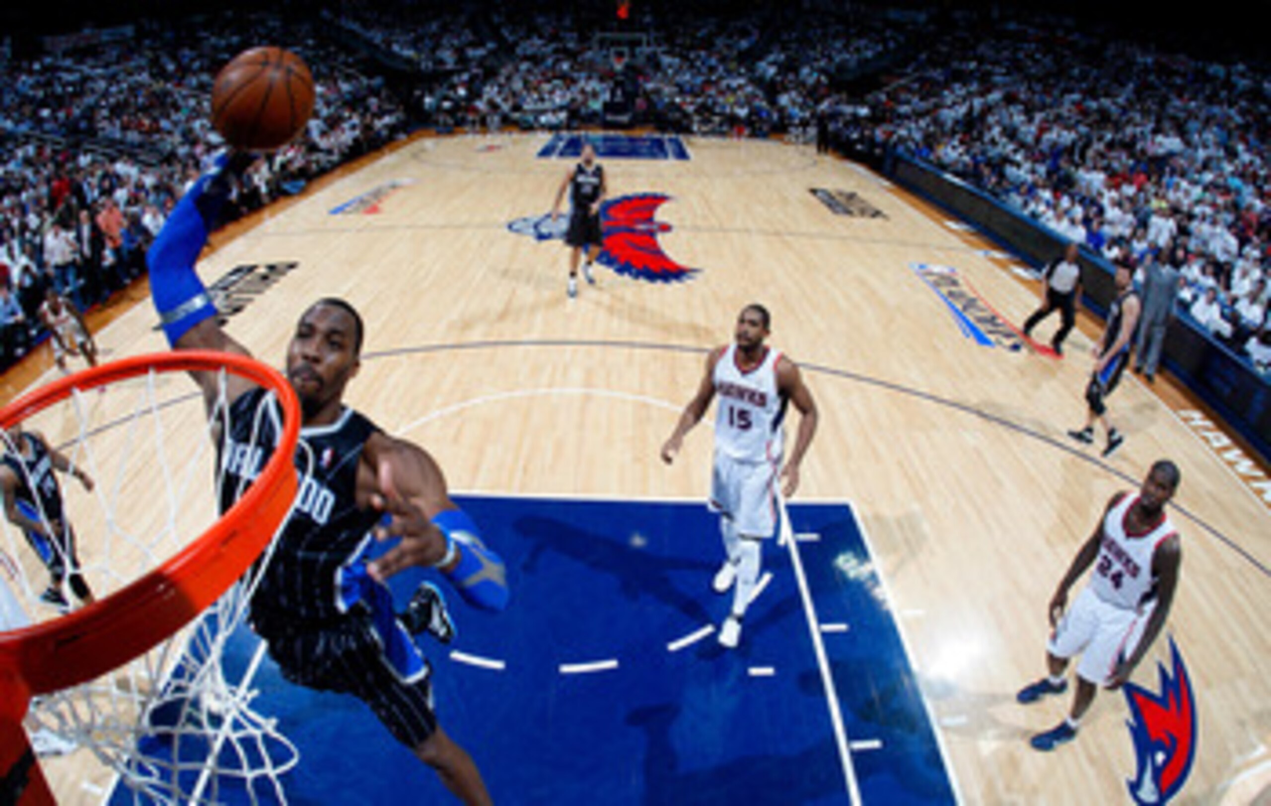 ATLANTA, GA - APRIL 28:  Dwight Howard #12 of the Orlando Magic dunks against the Atlanta Hawks during Game Six of the Eastern Conference Quarterfinals in the 2011 NBA Playoffs at Philips Arena on April 28, 2011 in Atlanta, Georgia.  NOTE TO USER: User ex
