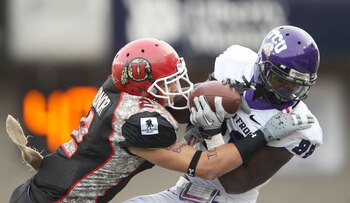 SALT LAKE CITY, UT - NOVEMBER 6: Brian Blechen #2 of the Utah Utes tackles Jimmy Young #88 of the TCU Horned Frogs during the second half of an NCAA Football game November 6, 2010 at Rice-Eccles Stadium in Salt Lake City, Utah. TCU Beat Utah 47-7.  (Photo