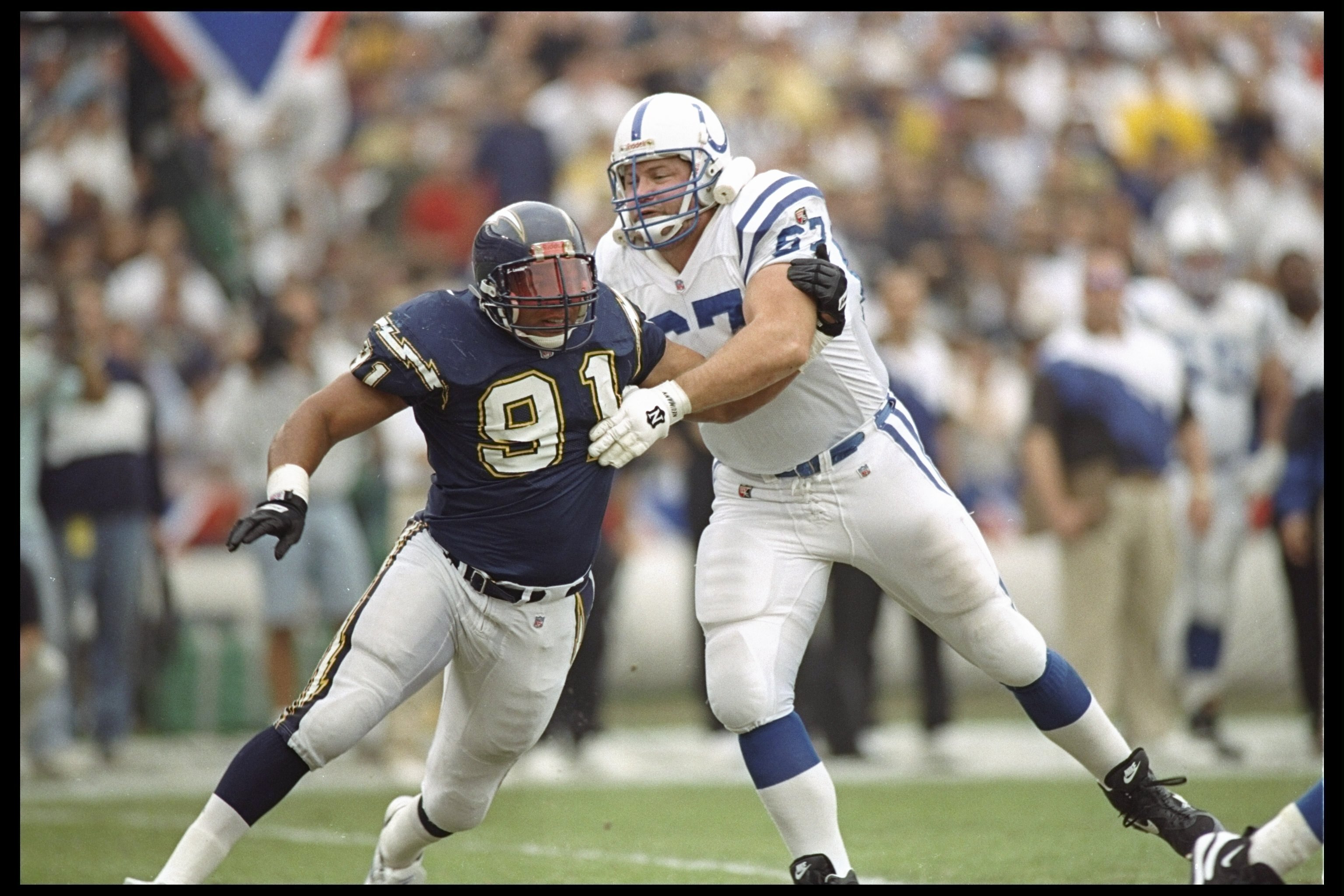 31 Dec 1995:  Defensive end Leslie O''Neal of the San Diego Chargers tries to fend off offensive lineman Will Wolford of the Indianapolis Colts at Jack Murphy Stadium in San Diego, California.  The Colts won the game 35-20.dit: Stephen Dunn  /Allsport