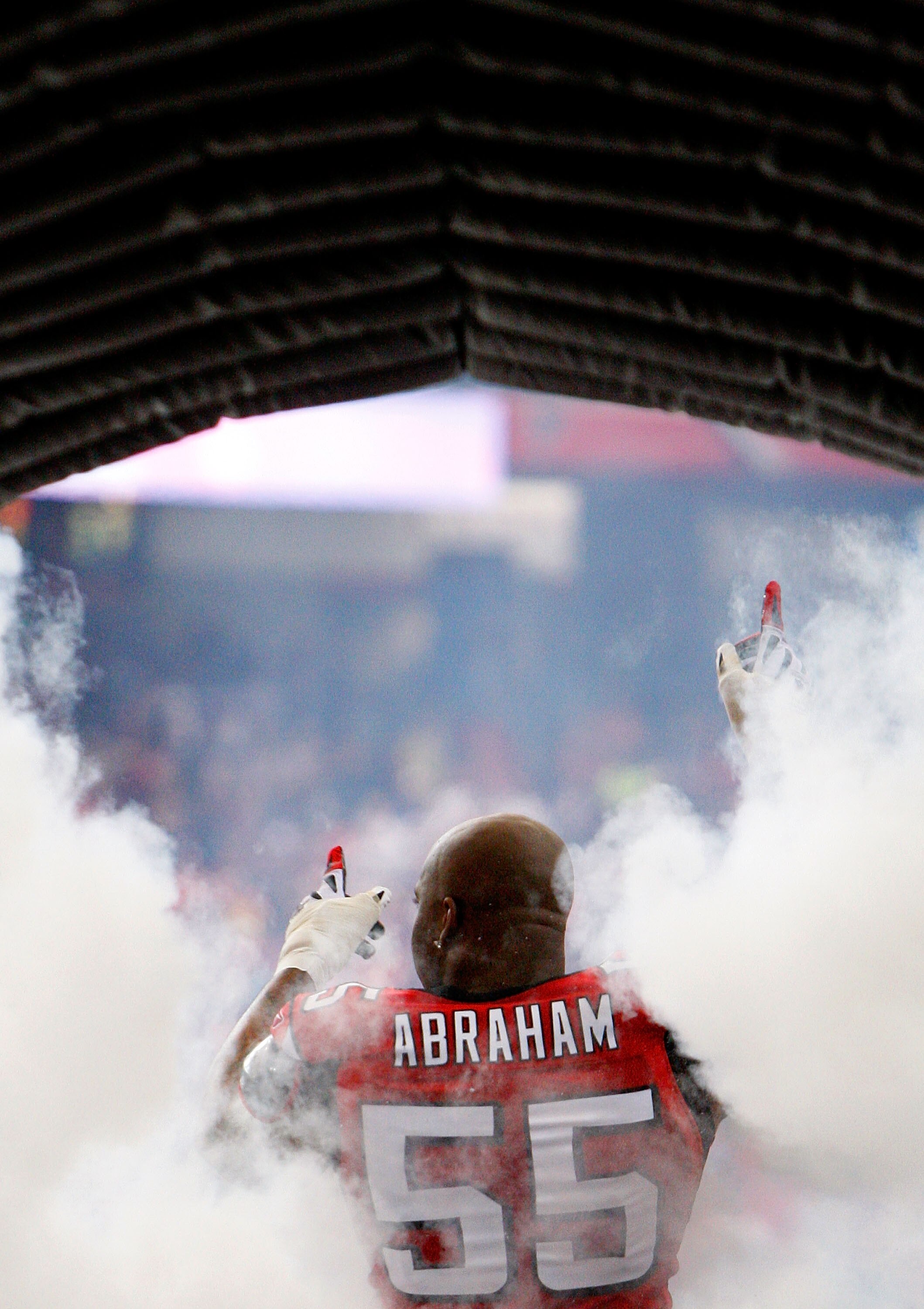 ATLANTA - NOVEMBER 08:  John Abraham #55 of the Atlanta Falcons is introduced before facing the Washington Redskins at Georgia Dome on November 8, 2009 in Atlanta, Georgia.  (Photo by Kevin C. Cox/Getty Images)