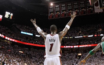 MIAMI, FL - MAY 11: Chris Bosh #1 of the Miami Heat celebrates after defeating the Boston Celtics in Game Five of the Eastern Conference Semifinals of the 2011 NBA Playoffs against the Boston Celtics at American Airlines Arena on May 11, 2011 in Miami, Fl