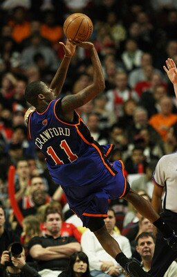 CHICAGO - JANUARY 08: Jamal Crawford #11 of the New York Knicks puts up an off-balance shot against the Chicago Bulls on January 8, 2008 at the United Center in Chicago, Illinois. The Knicks defeated the Bulls 105-100. NOTE TO USER: User expressly acknowl