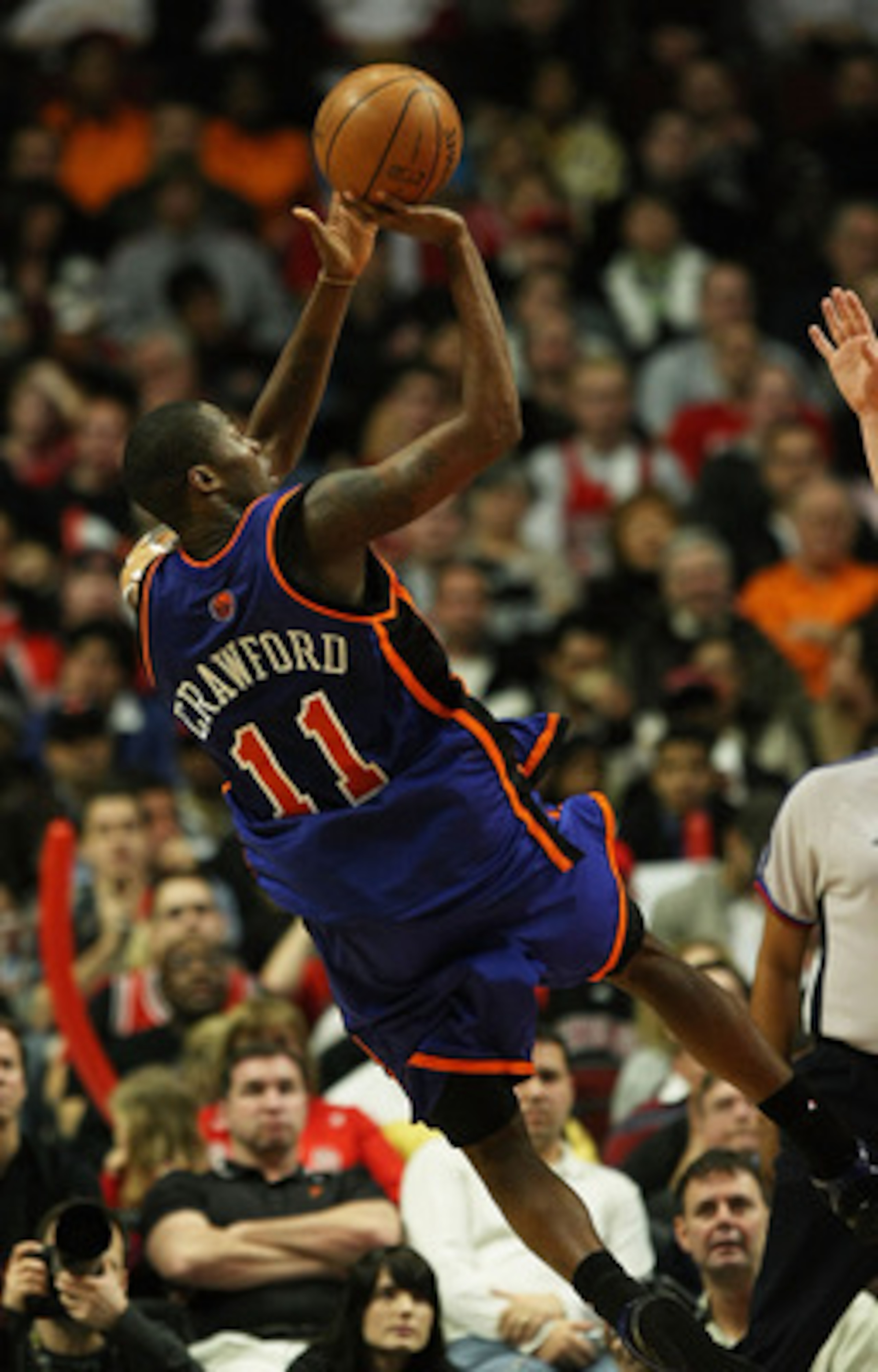 CHICAGO - JANUARY 08: Jamal Crawford #11 of the New York Knicks puts up an off-balance shot against the Chicago Bulls on January 8, 2008 at the United Center in Chicago, Illinois. The Knicks defeated the Bulls 105-100. NOTE TO USER: User expressly acknowl