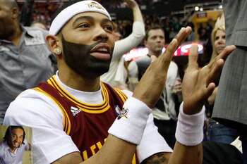 CLEVELAND - MARCH 29: Joe Haden of the Cleveland Browns cheers on the Cleveland Cavaliers during the game against the Miami Heat on March 29, 2011 at Quicken Loans Arena in Cleveland, Ohio. NOTE TO USER: User expressly acknowledges and agrees that, by dow