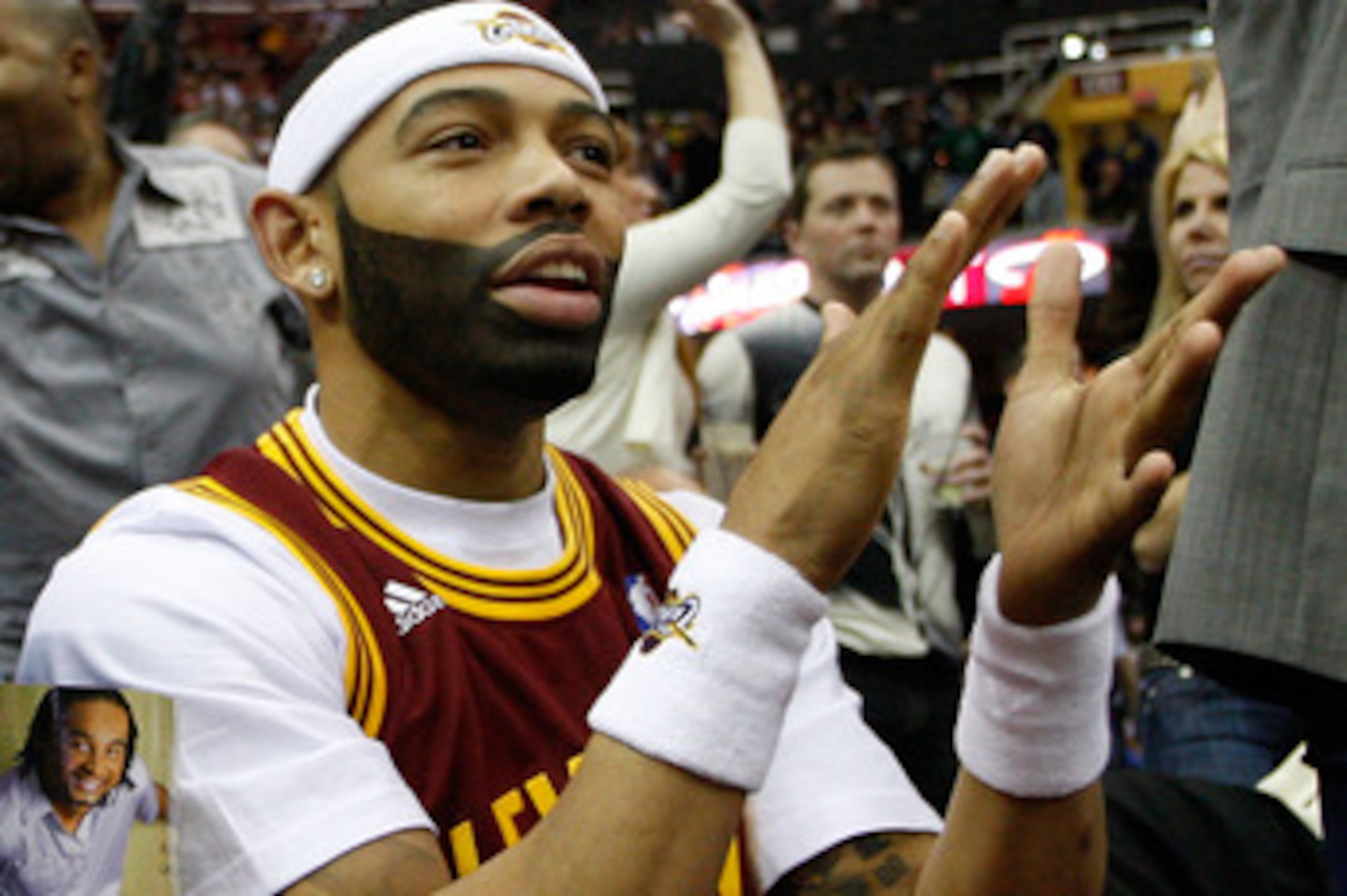 CLEVELAND - MARCH 29: Joe Haden of the Cleveland Browns cheers on the Cleveland Cavaliers during the game against the Miami Heat on March 29, 2011 at Quicken Loans Arena in Cleveland, Ohio. NOTE TO USER: User expressly acknowledges and agrees that, by dow