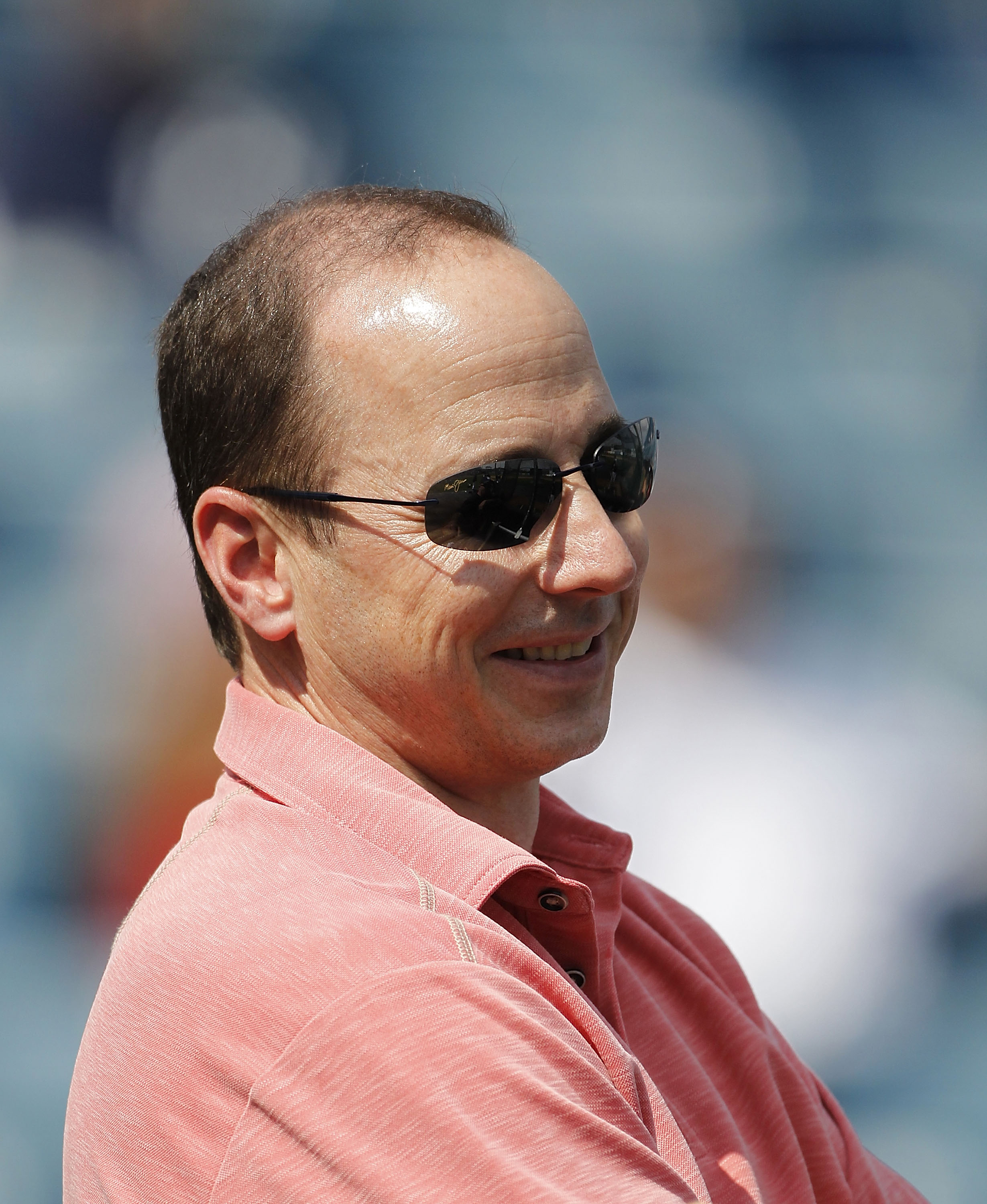 TAMPA, FL - FEBRUARY 20: Brian Cashman Senior Vice President and General Manager of the New York Yankees watch the action during the first full team workout of Spring Training on February 20, 2011 at the George M. Steinbrenner Field in Tampa, Florida.  (P