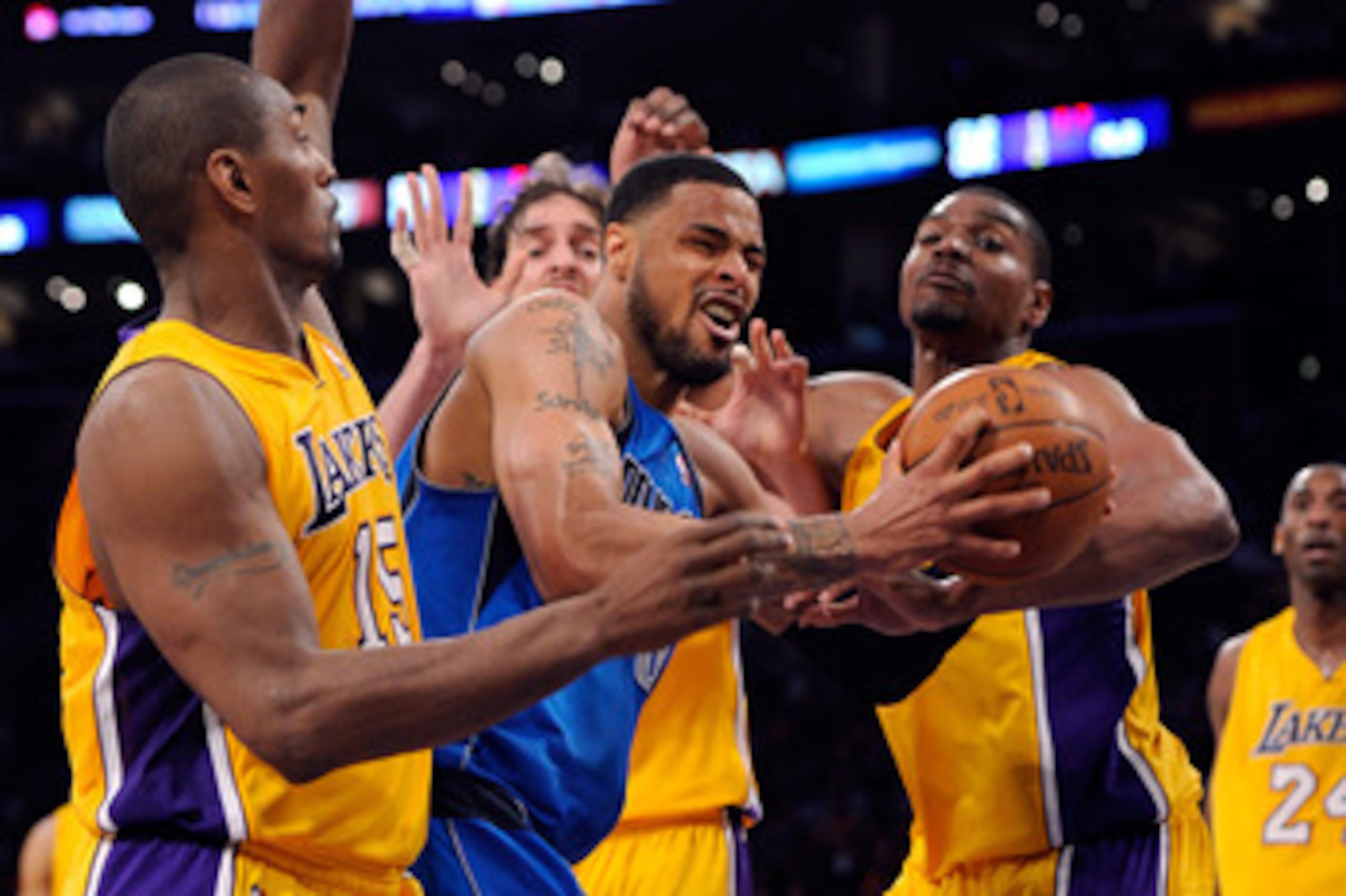 LOS ANGELES, CA - MAY 04:  Tyson Chandler #6 of the Dallas Mavericks has the ball as he goes up against Pau Gasol #16, Andrew Bynum #17 and Ron Artest #15 of the Los Angeles Lakers in the second quarter in Game Two of the Western Conference Semifinals in