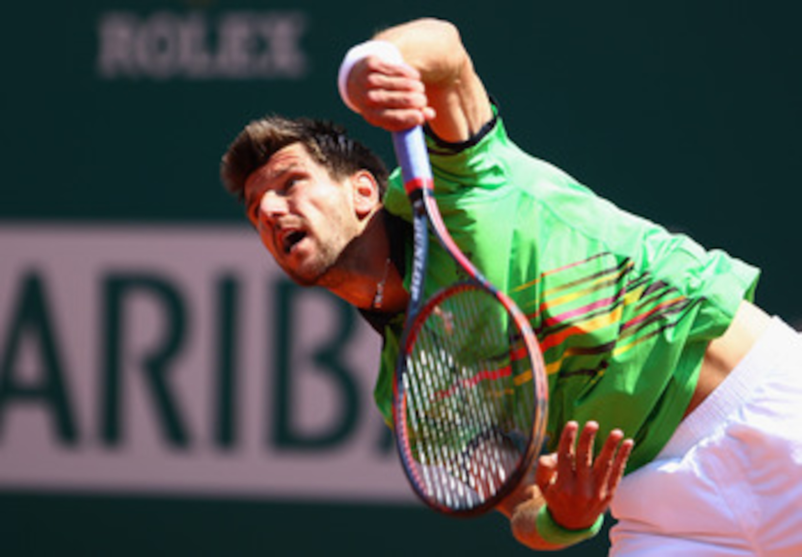 MONACO - APRIL 16:  Jurgen Melzer of Austria serves to David Ferrer of Spain during Day Seven of the ATP Masters Series Tennis at the Monte Carlo Country Club on April 16, 2011 in Monte Carlo, Monaco.  (Photo by Julian Finney/Getty Images)