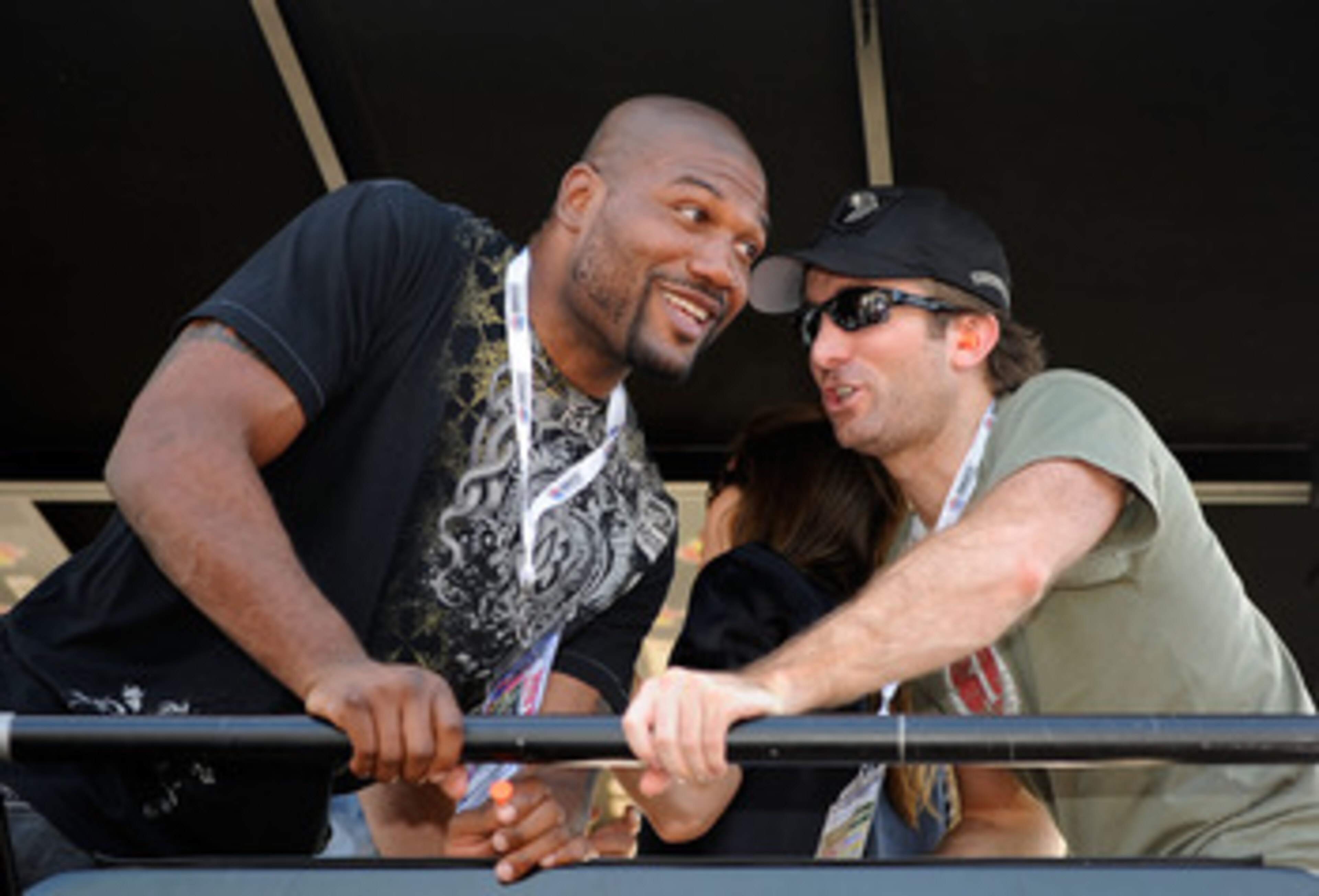 CONCORD, NC - MAY 30:  Actors Sharlto Copley (R) and Quinton 'Rampage' Jackson talk in the #39 U.S. Army Chevrolet pit box prior to the NASCAR Sprint Cup Series Coca-Cola 600 at Charlotte Motor Speedway on May 30, 2010 in Concord, North Carolina.  (Photo 