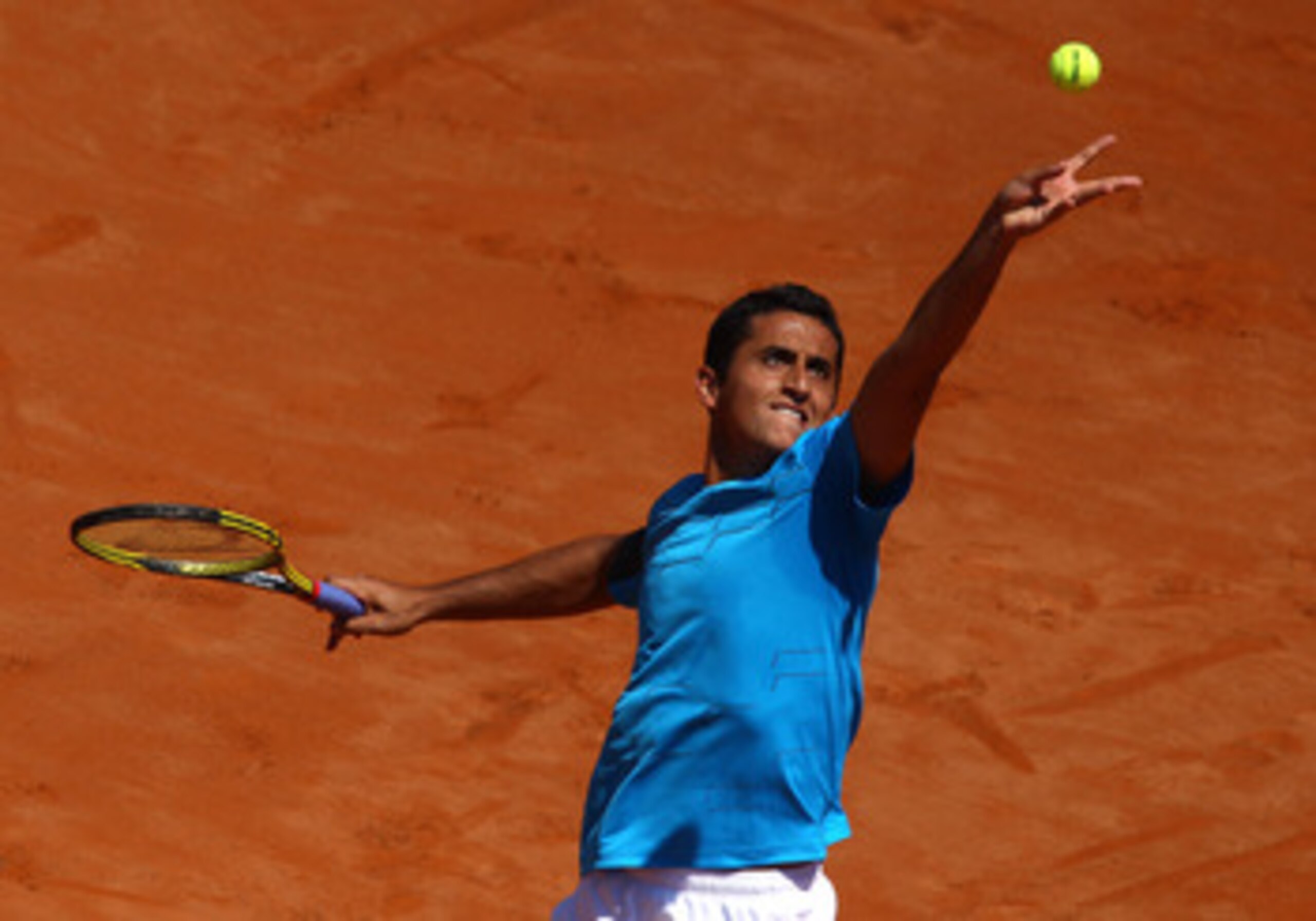 ROME, ITALY - MAY 10:  Nicolas Almagro of Spain serves during the his first round match against Simone Bolelli of Italy during day three of the Internazionali BNL d'Italia at the Foro Italico Tennis Centre on May 10, 2011 in Rome, Italy.  (Photo by Alex L