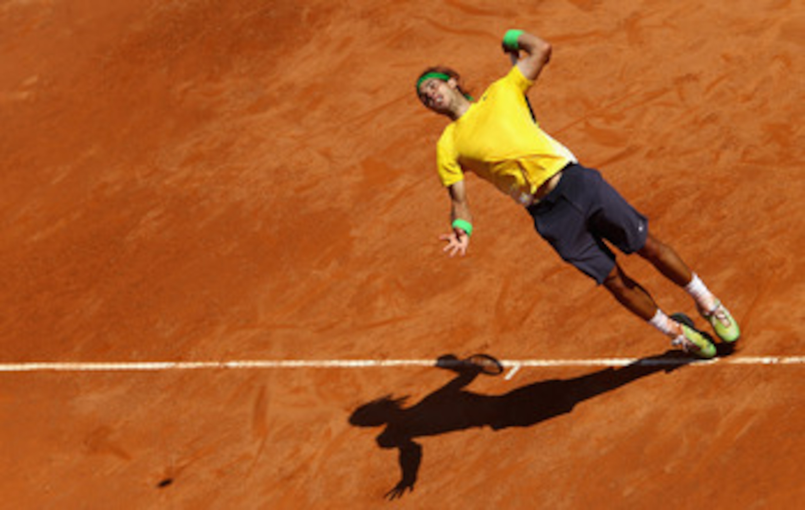 ROME, ITALY - MAY 13:  Rafael Nadal of Spain serves during his quarter final match against Marin Cilic of Croatia during day six of the Internazoinali BNL D'Italia at the Foro Italico Tennis Centre  on May 13, 2011 in Rome, Italy.  (Photo by Clive Brunski